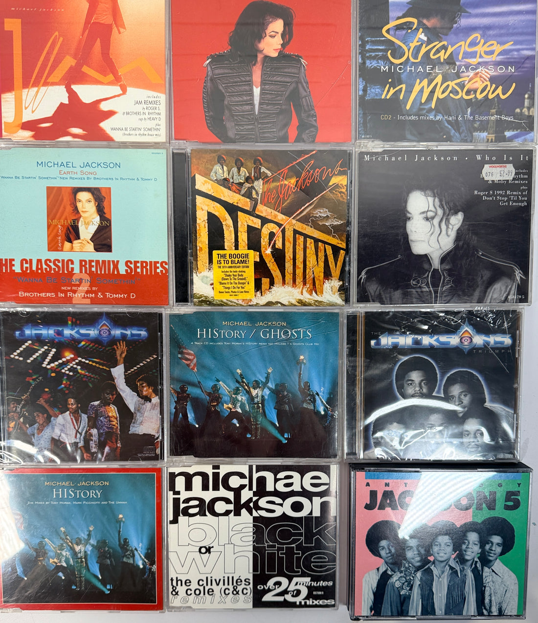 Michael Jackson CD lot with albums, singles, Jacksons and Jackson 5 titles. Collector bundle featuring HIStory, Blood On The Dance Floor and more.