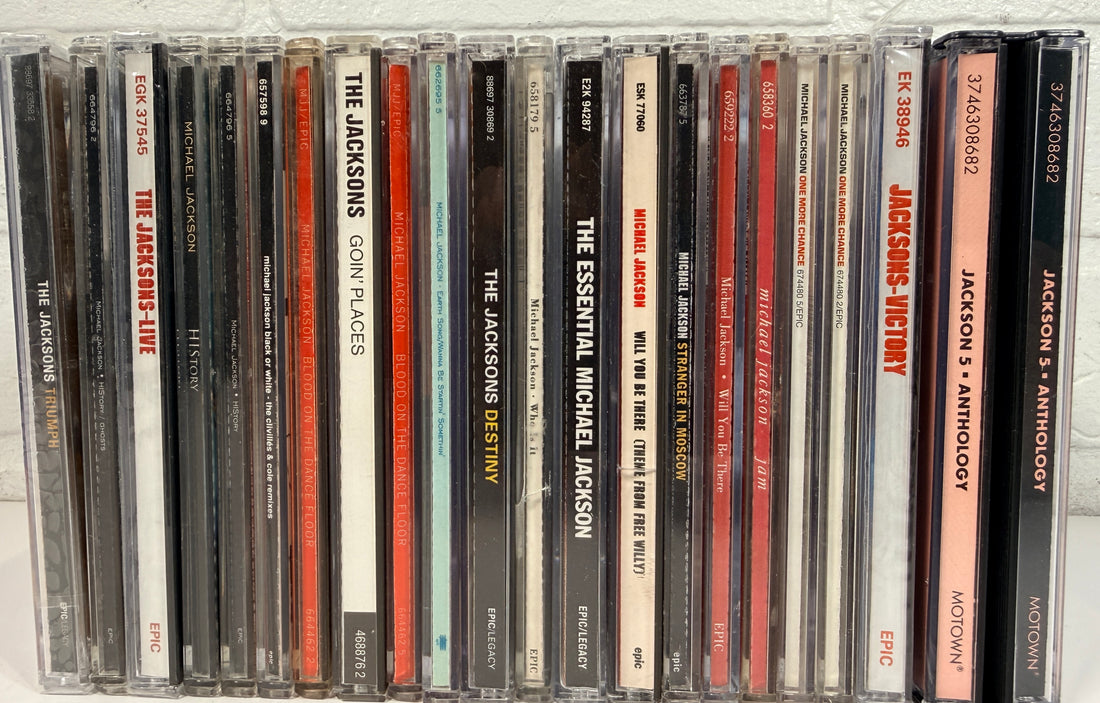 Michael Jackson CD lot with albums, singles, Jacksons and Jackson 5 titles. Collector bundle featuring HIStory, Blood On The Dance Floor and more.