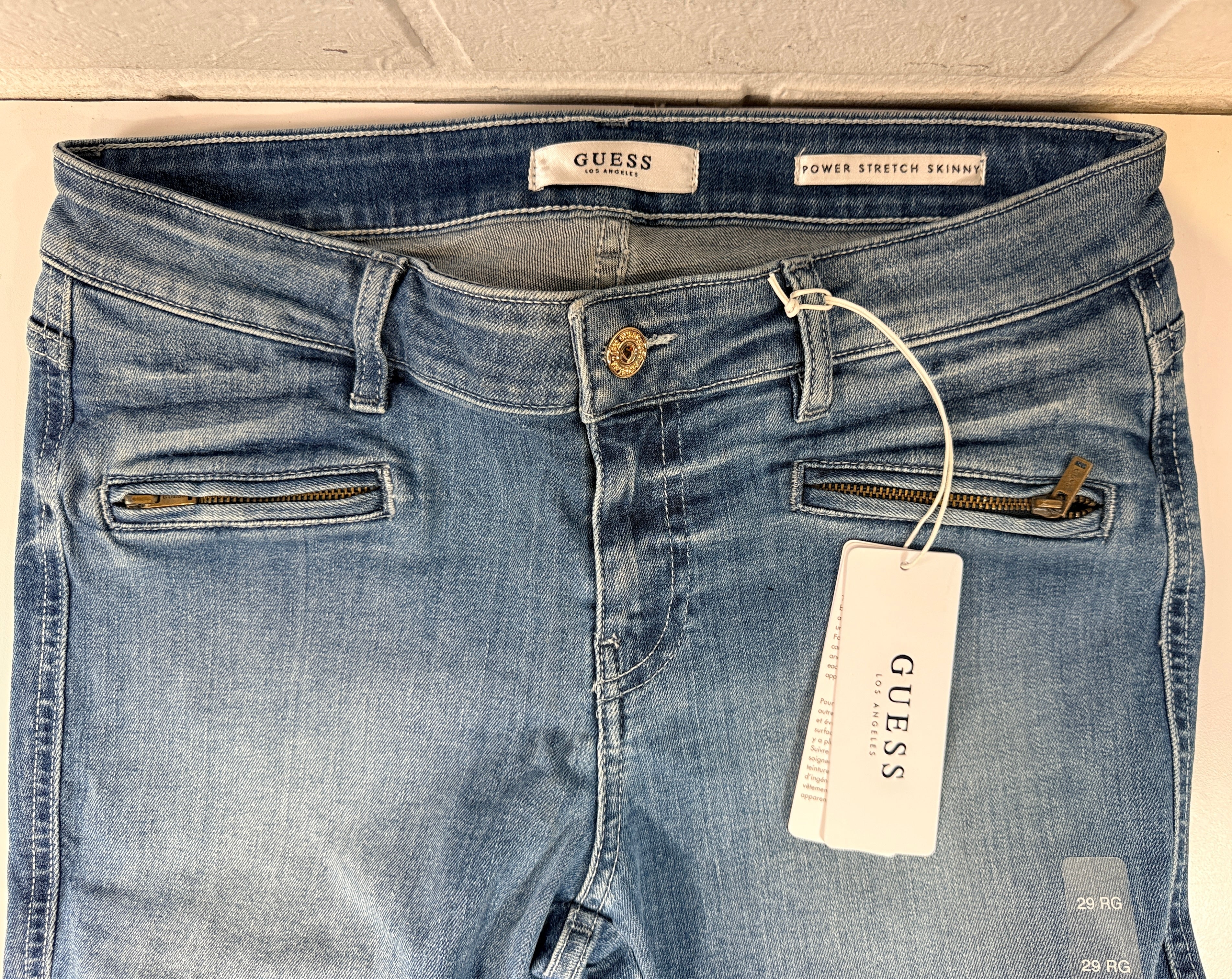 GUESS Power Stretch Skinny jeans women’s size 29 in medium wash. New with tags stretch denim featuring zip pockets and ankle zips. Stylish everyday fit.