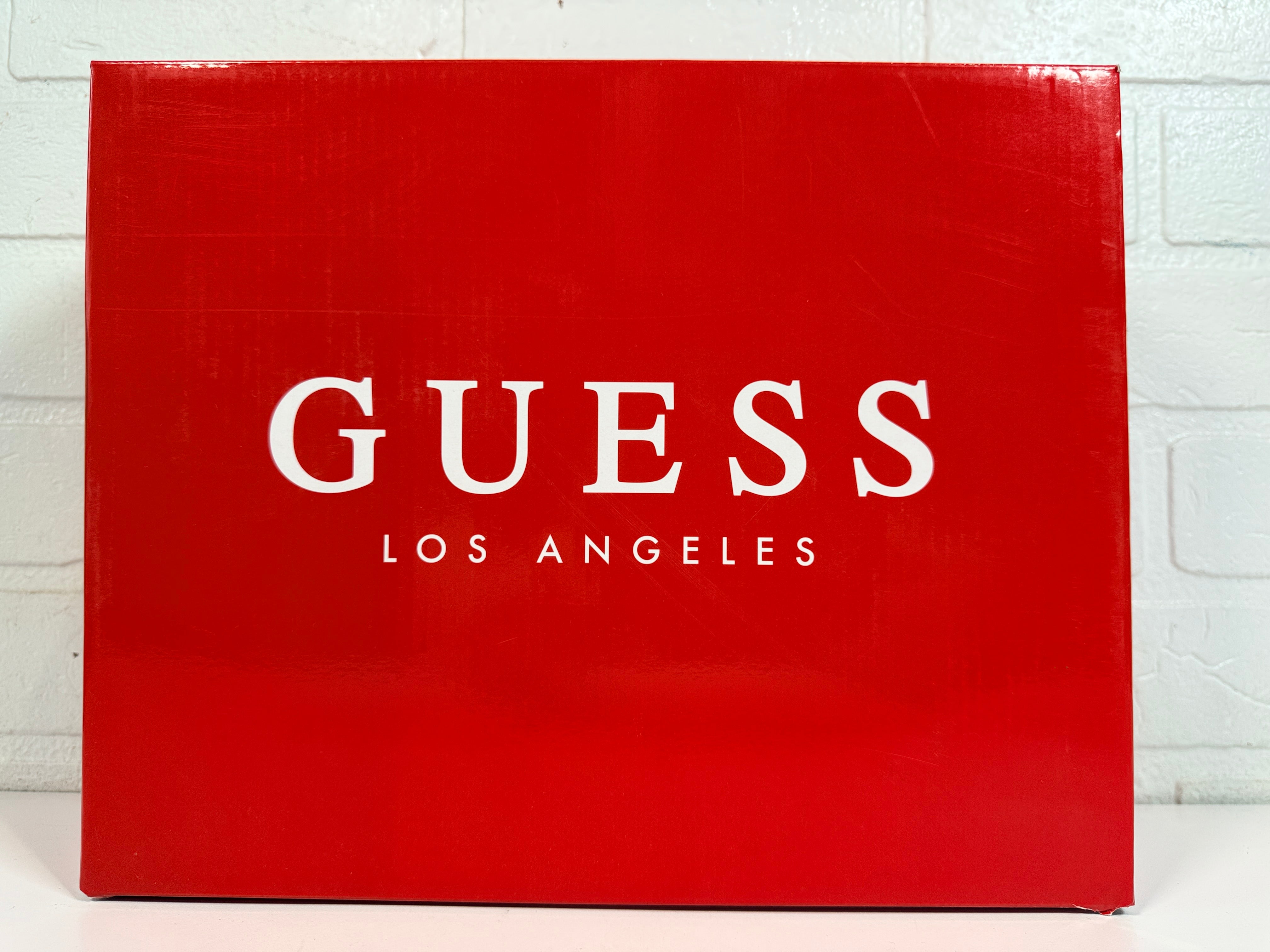 GUESS black platform ankle boots with faux fur trim, lace-up front, side zip and chunky heel. New in box designer women’s fashion boots.
