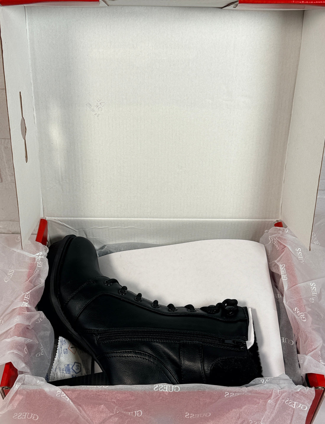 GUESS black platform ankle boots with faux fur trim, lace-up front, side zip and chunky heel. New in box designer women’s fashion boots.