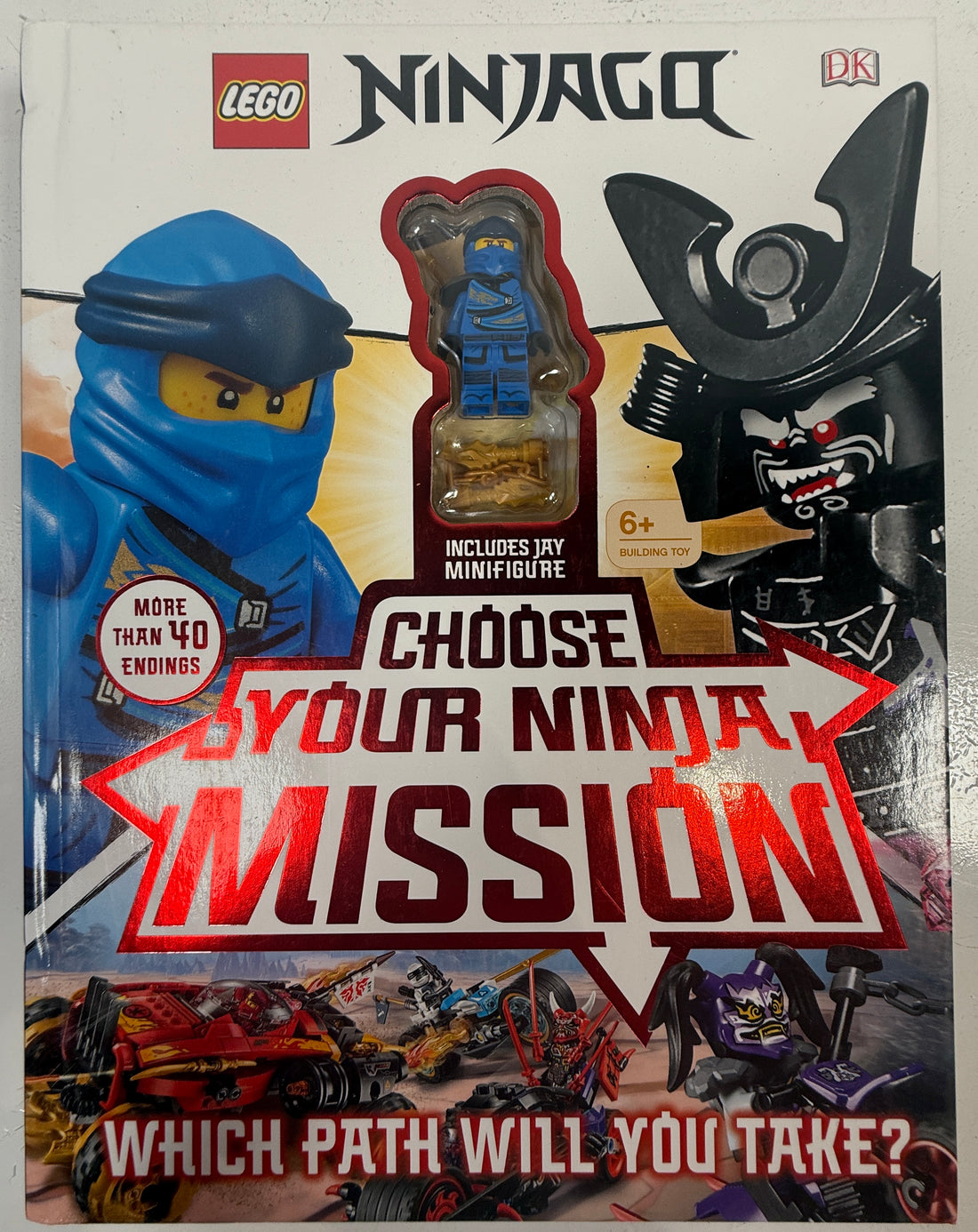 LEGO Ninjago toy set packaging with two ninjas and a minifigure, featuring the text 'Choose Your Ninja Mission'.