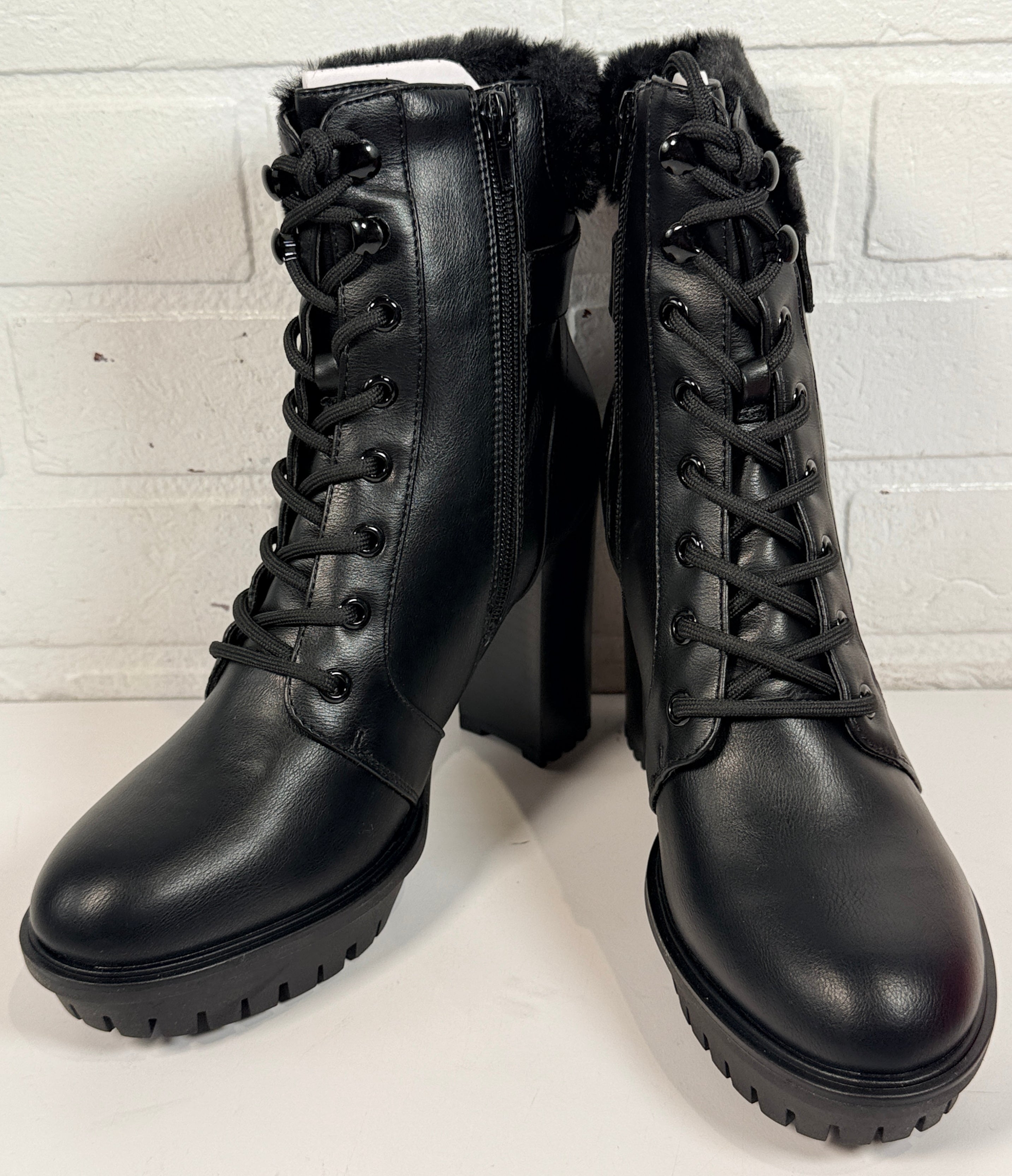 GUESS black platform ankle boots with faux fur trim, lace-up front, side zip and chunky heel. New in box designer women’s fashion boots.