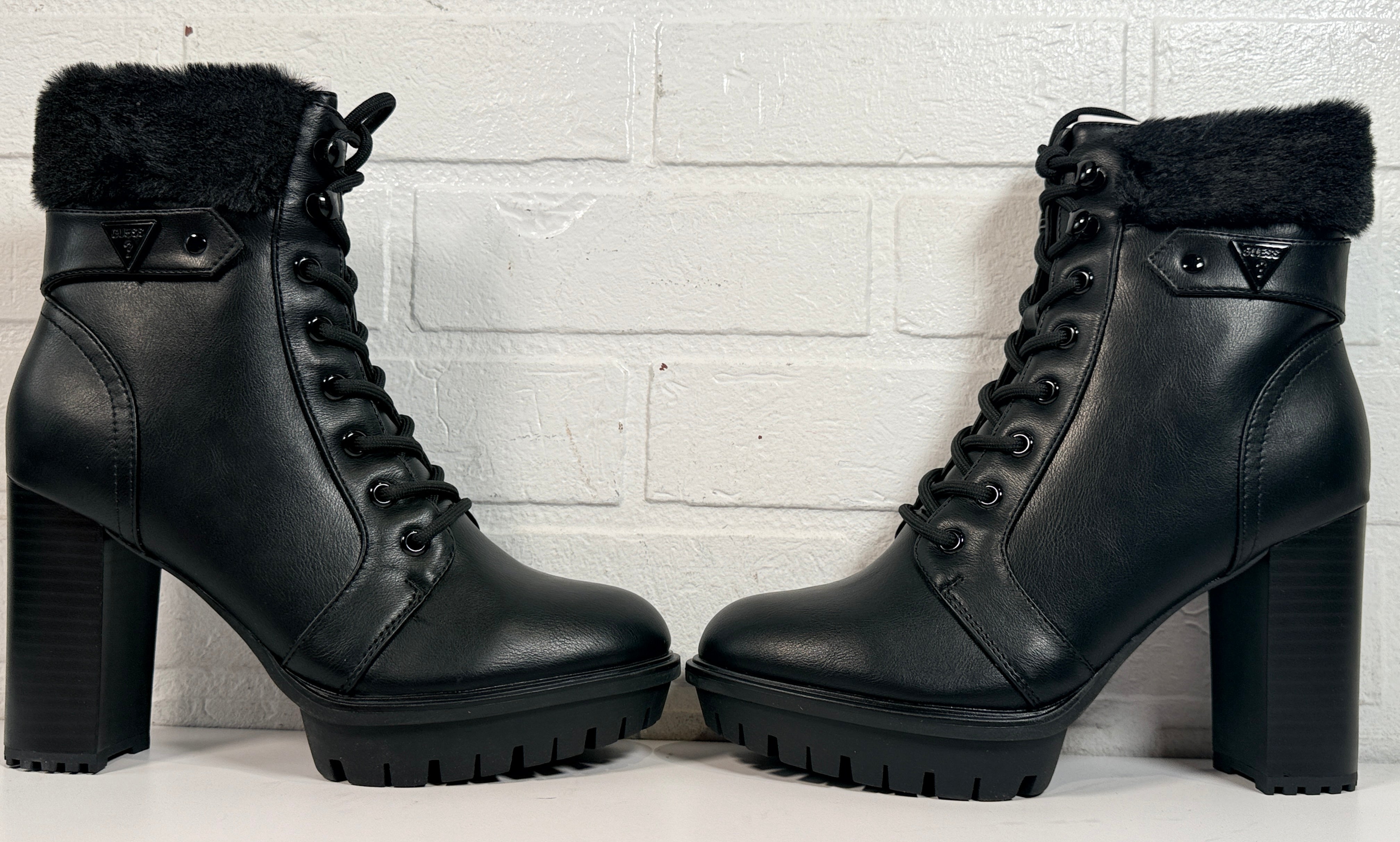 GUESS black platform ankle boots with faux fur trim, lace-up front, side zip and chunky heel. New in box designer women’s fashion boots.