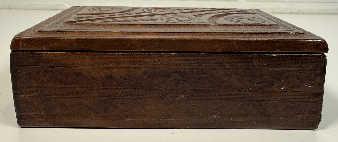 Vintage leather covered wooden box with hand tooled geometric design. Rustic keepsake jewelry storage box with removable lid and handmade charm.