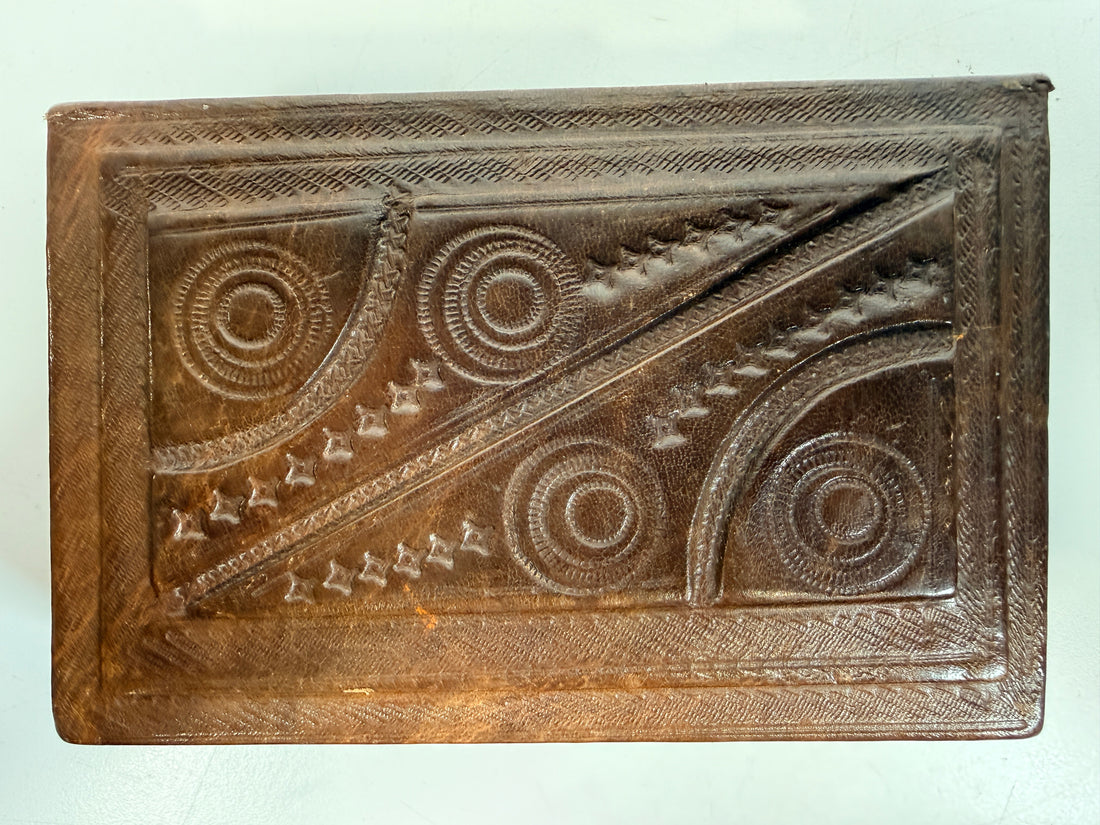 Vintage leather covered wooden box with hand tooled geometric design. Rustic keepsake jewelry storage box with removable lid and handmade charm.
