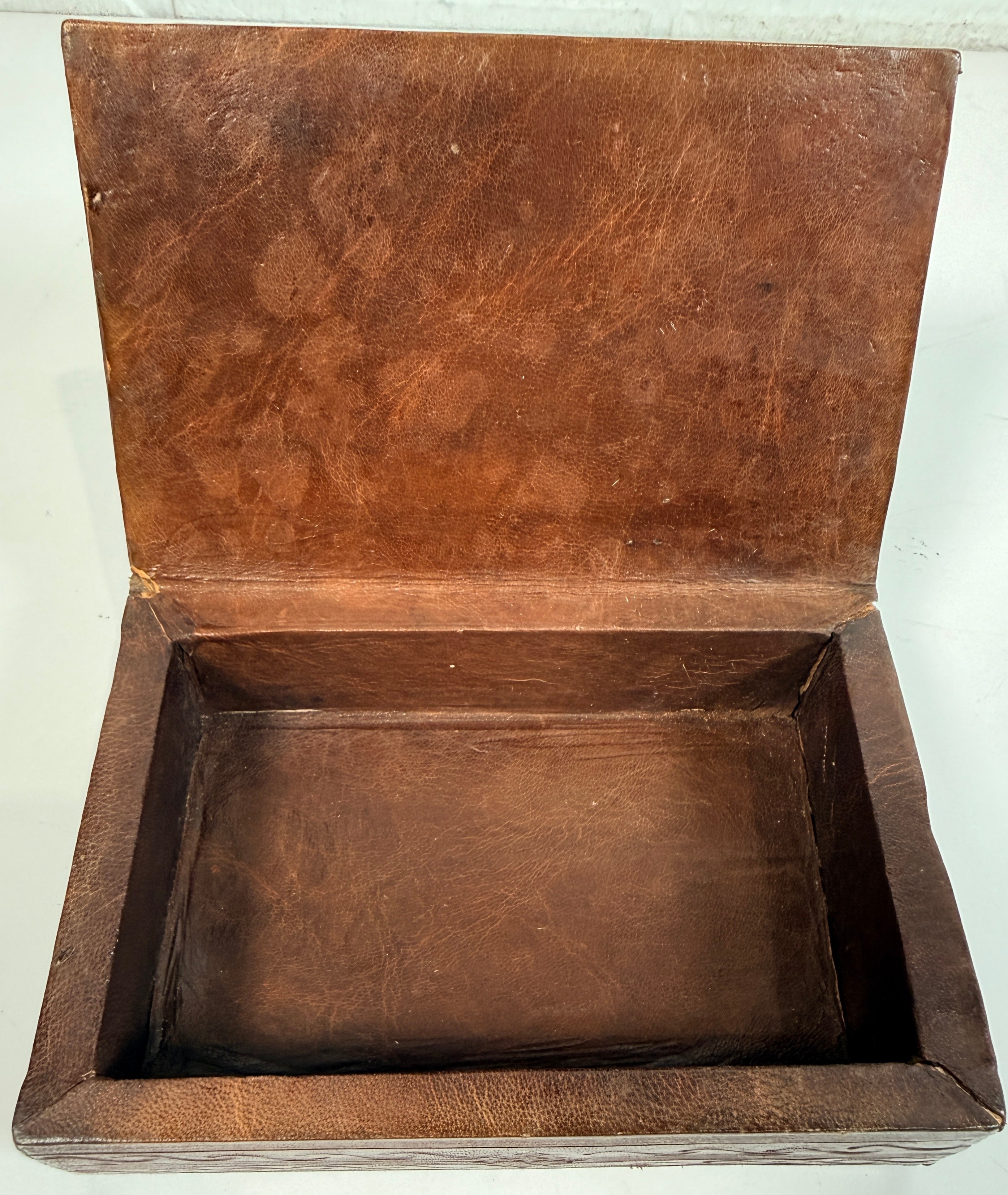 Vintage leather covered wooden box with hand tooled geometric design. Rustic keepsake jewelry storage box with removable lid and handmade charm.