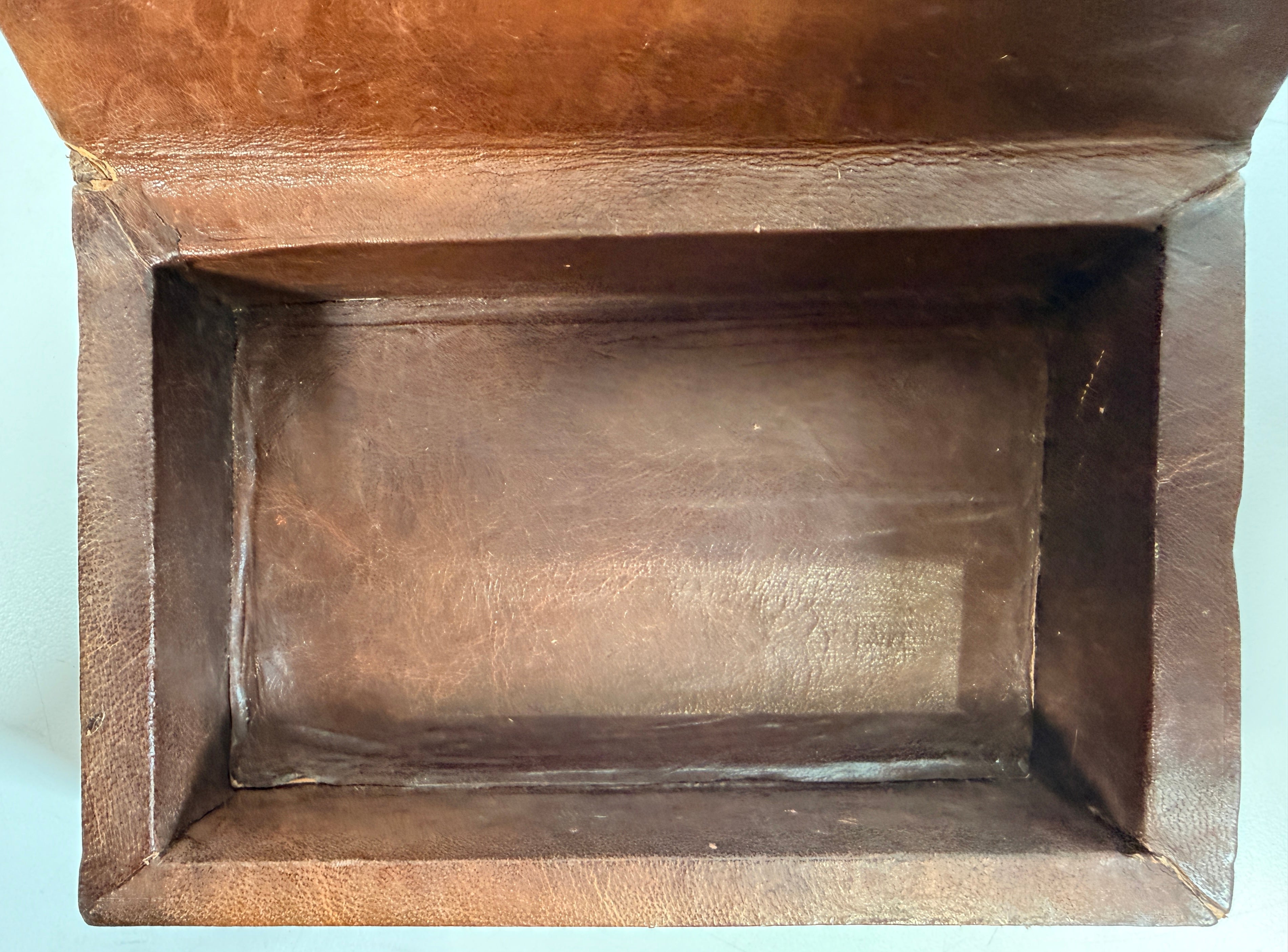 Vintage leather covered wooden box with hand tooled geometric design. Rustic keepsake jewelry storage box with removable lid and handmade charm.