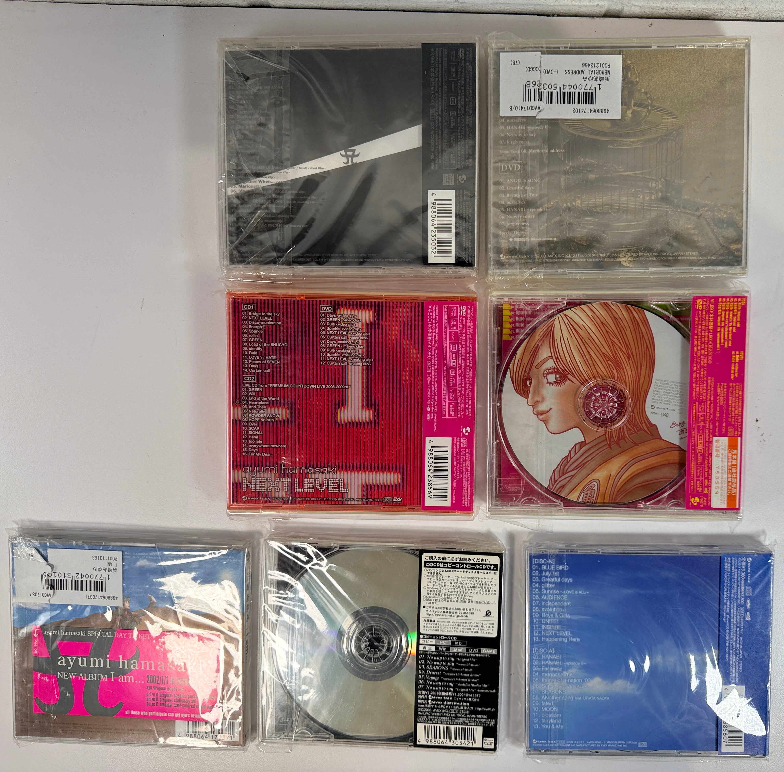 Ayumi Hamasaki sealed Japan import CD lot of 7 albums and singles with CD+DVD editions. Rare J-Pop Avex Trax collection in unopened condition.