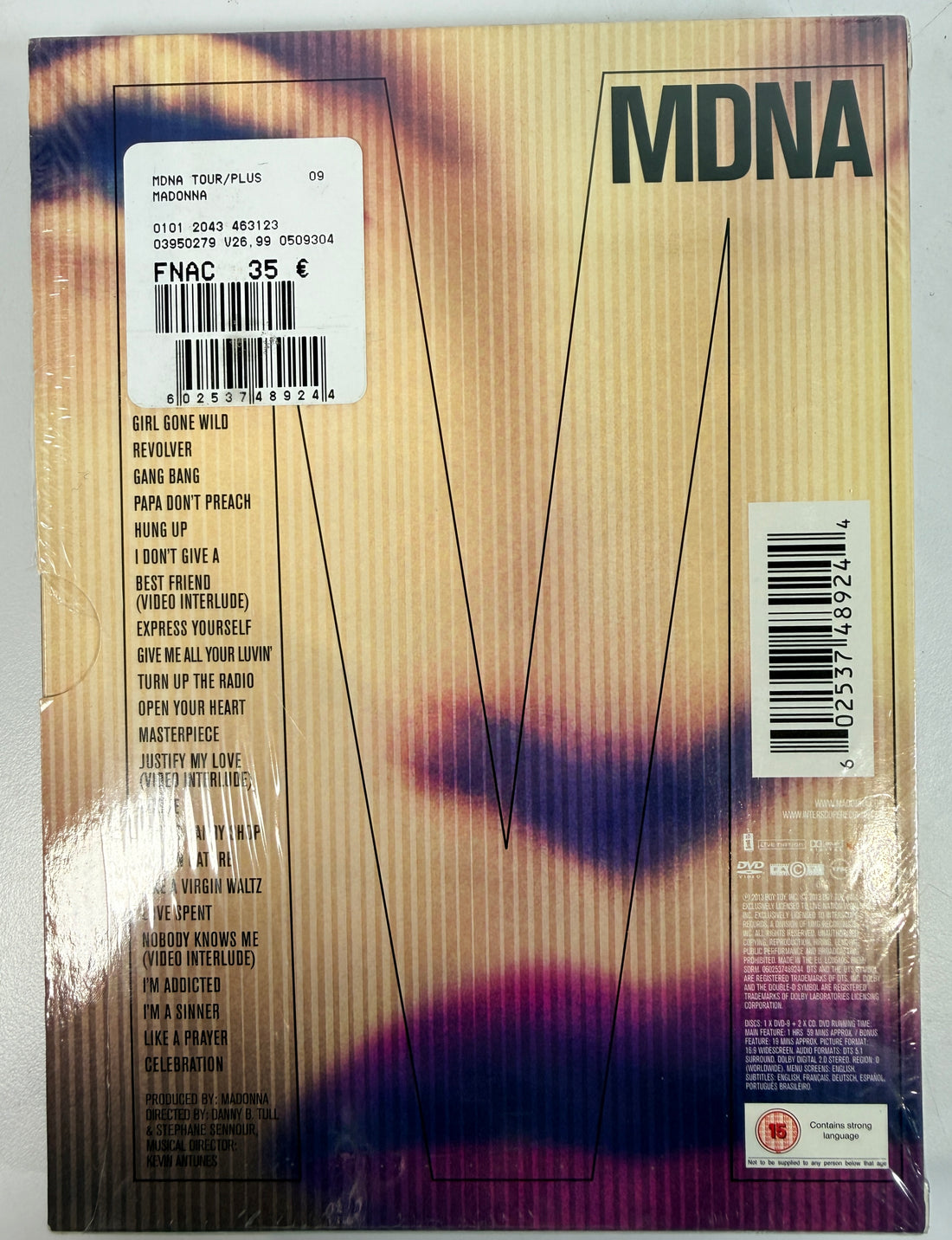 Madonna MDNA World Tour deluxe DVD + 2CD set with collector digipak packaging. Complete live concert edition with bonus content and worldwide region DVD.