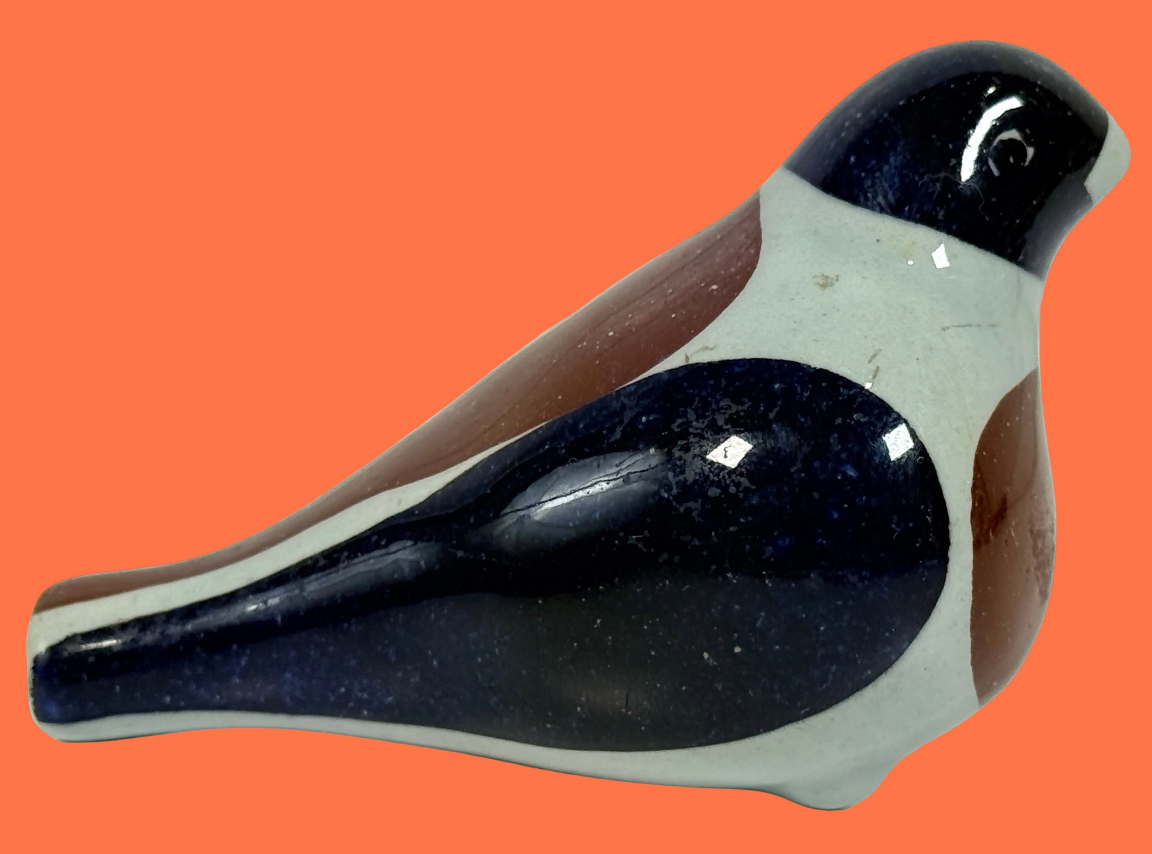 Vintage Royal Copenhagen Denmark bird figurine model 220/2989 with painter mark B. Mid-century Scandinavian ceramic décor collectible with Danish modern style.