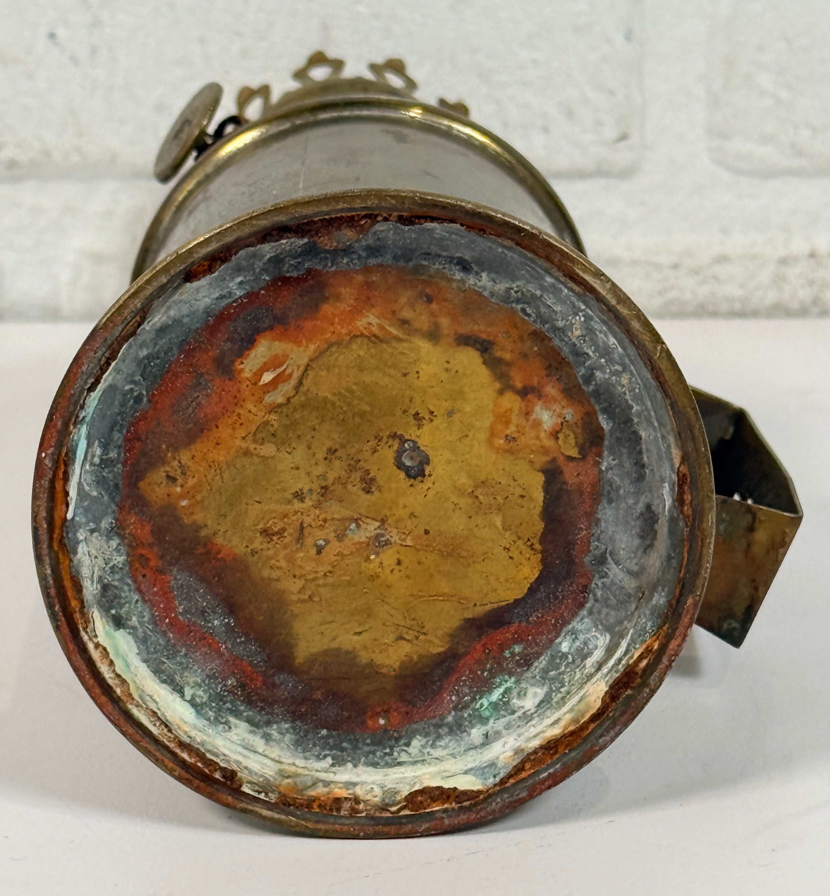 Vintage Lampe Pigeon French safety lamp with brass wall mount body, engraved markings and original patina. Collectible industrial décor display piece.
