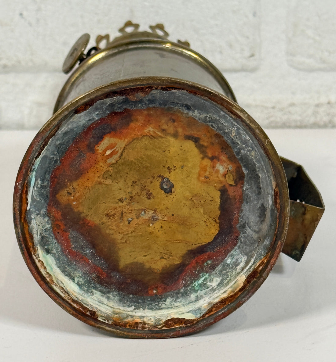 Vintage Lampe Pigeon French safety lamp with brass wall mount body, engraved markings and original patina. Collectible industrial décor display piece.