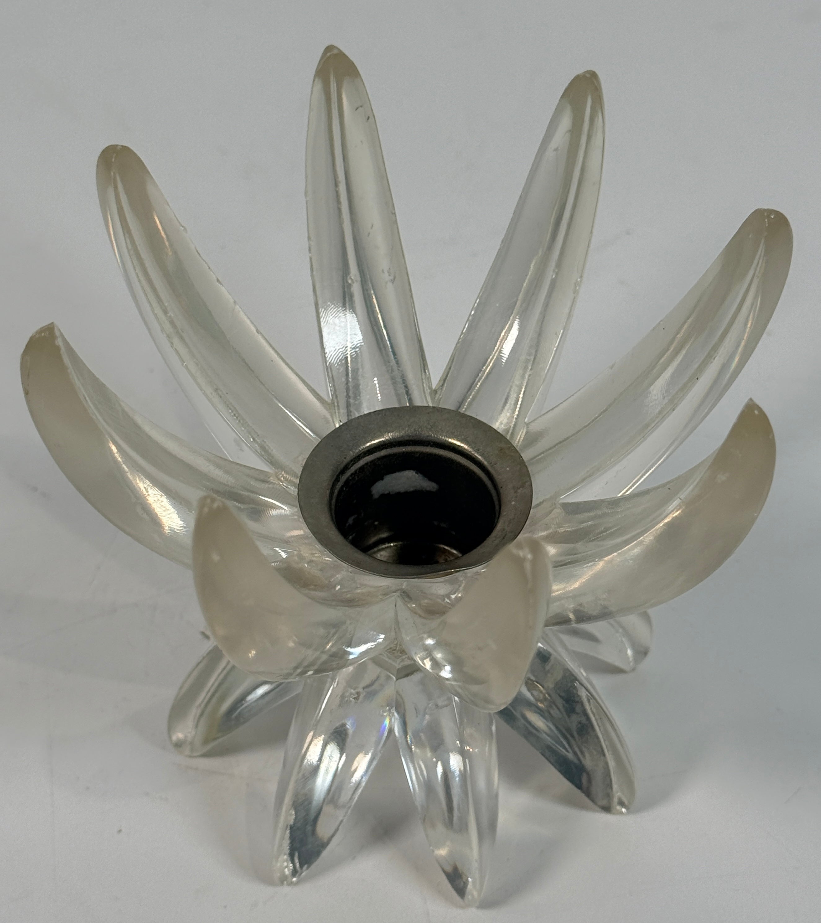 Vintage West German lucite lotus candle holder in clear acrylic. Mid-century floral décor piece with original label and sculptural retro design.