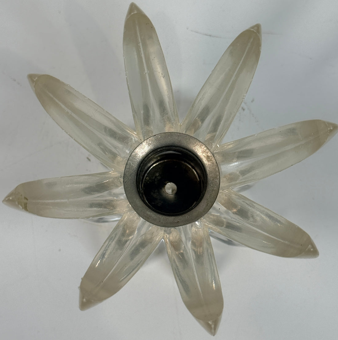 Vintage West German lucite lotus candle holder in clear acrylic. Mid-century floral décor piece with original label and sculptural retro design.