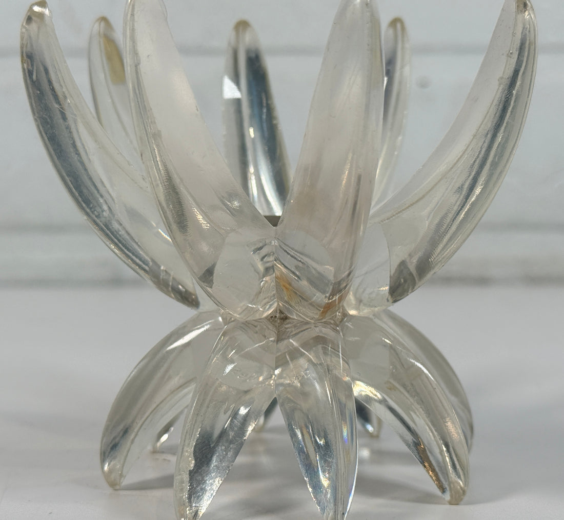 Vintage West German lucite lotus candle holder in clear acrylic. Mid-century floral décor piece with original label and sculptural retro design.