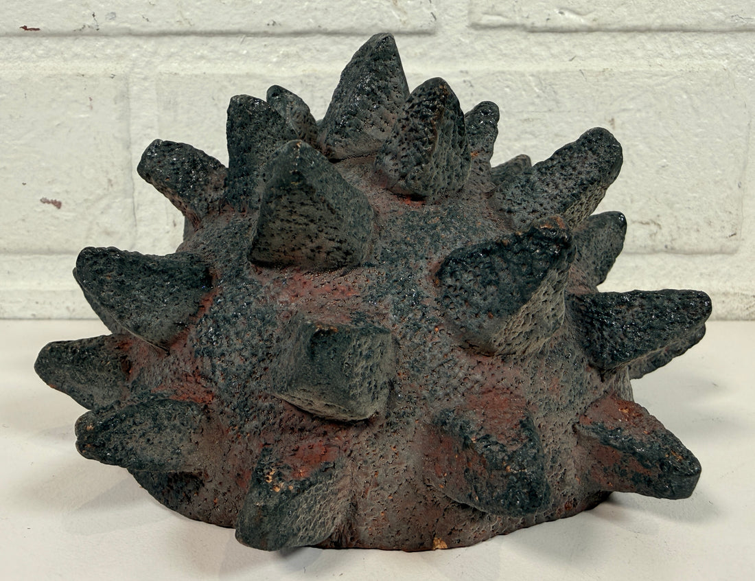 Vintage Brutalist studio pottery bowl with spiked sea urchin form, textured black exterior and glazed interior. Rare sculptural MCM centerpiece décor