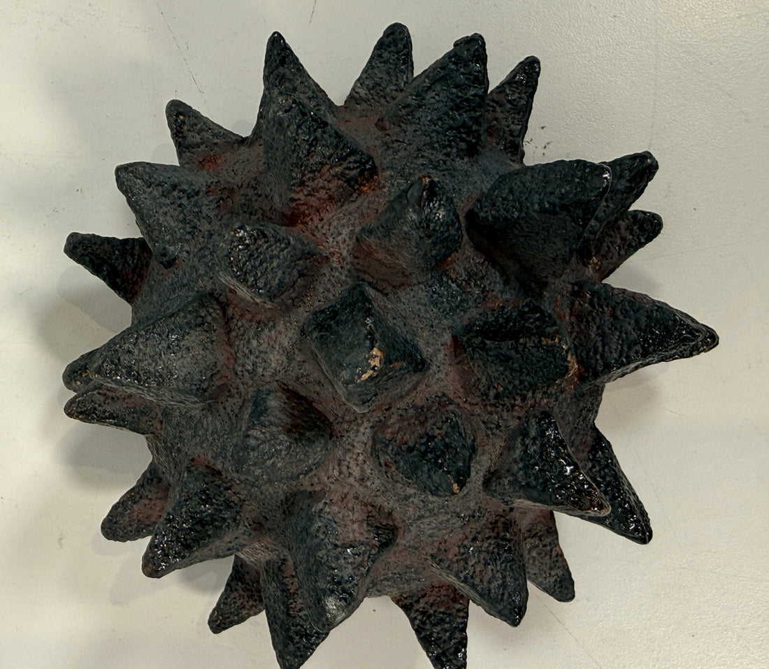 Vintage Brutalist studio pottery bowl with spiked sea urchin form, textured black exterior and glazed interior. Rare sculptural MCM centerpiece décor