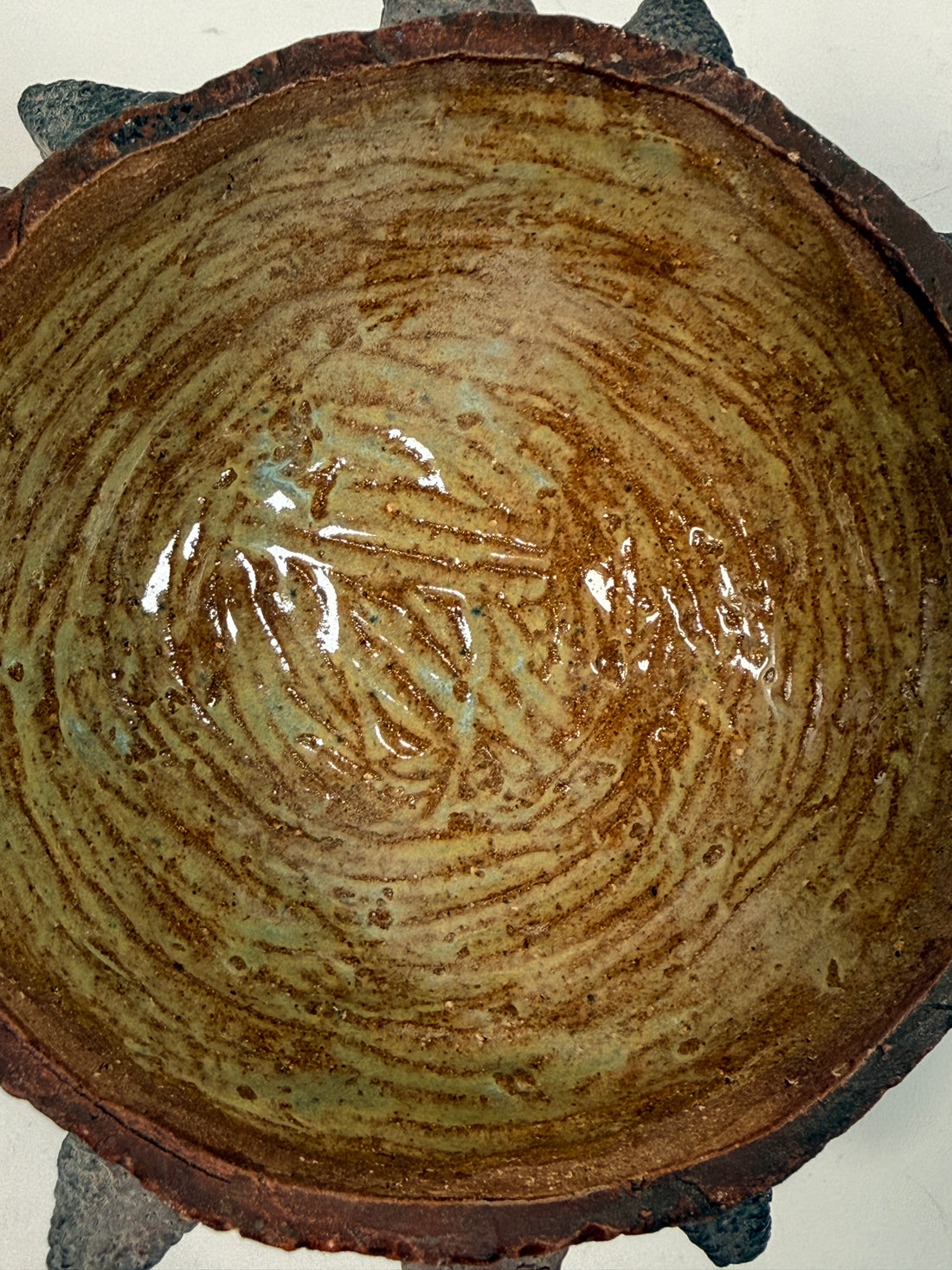 Vintage Brutalist studio pottery bowl with spiked sea urchin form, textured black exterior and glazed interior. Rare sculptural MCM centerpiece décor