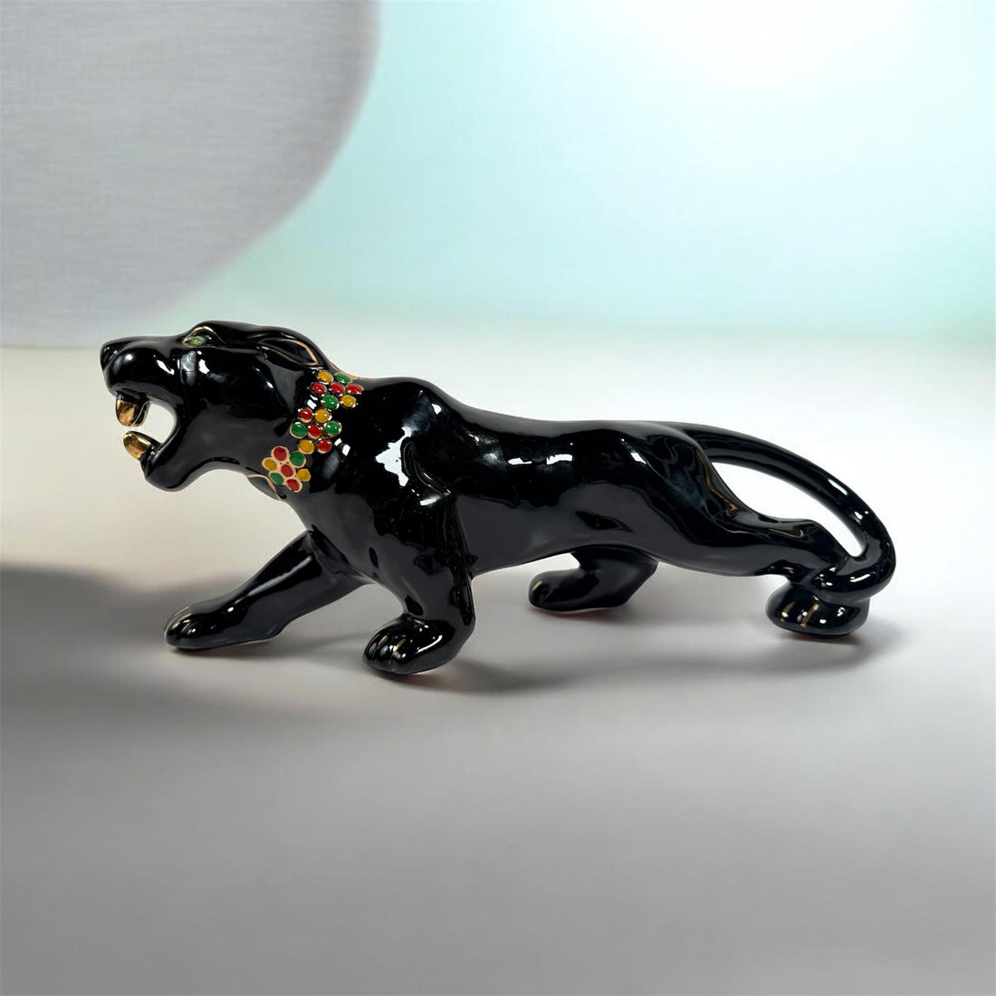 Vintage Japanese black panther ceramic statue with jeweled collar, made in Japan MCM décor collectible for shelf or bar display.