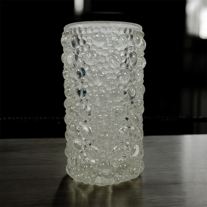 Mid-century modern clear bubble glass cylinder vase with Scandinavian style. Heavy textured art glass décor piece from the 1960s–70s.