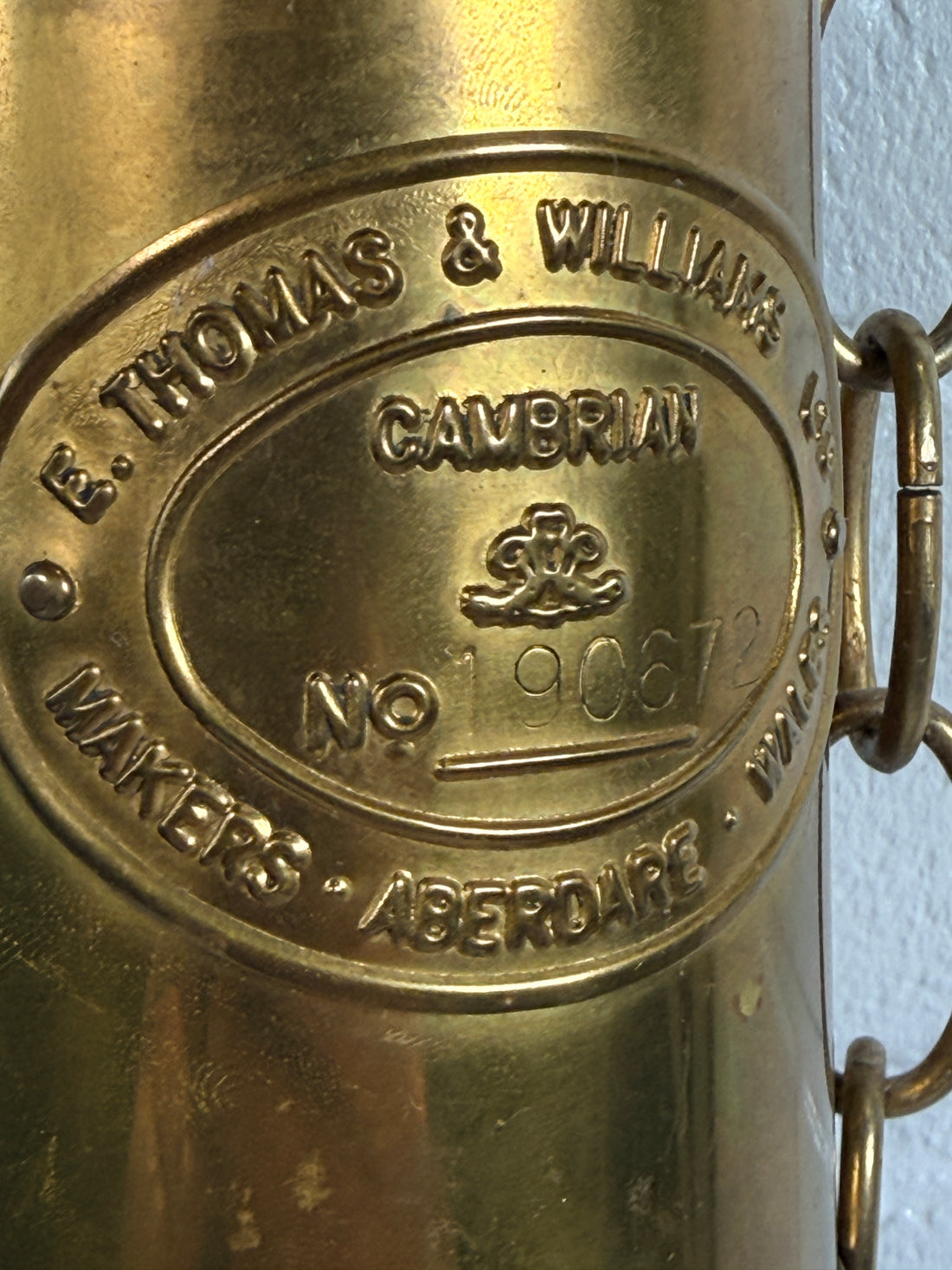 Authentic Thomas Williams Cambrian Welsh miners lamp in brass with chain. Classic industrial decor collectible marked Aberdare Wales.