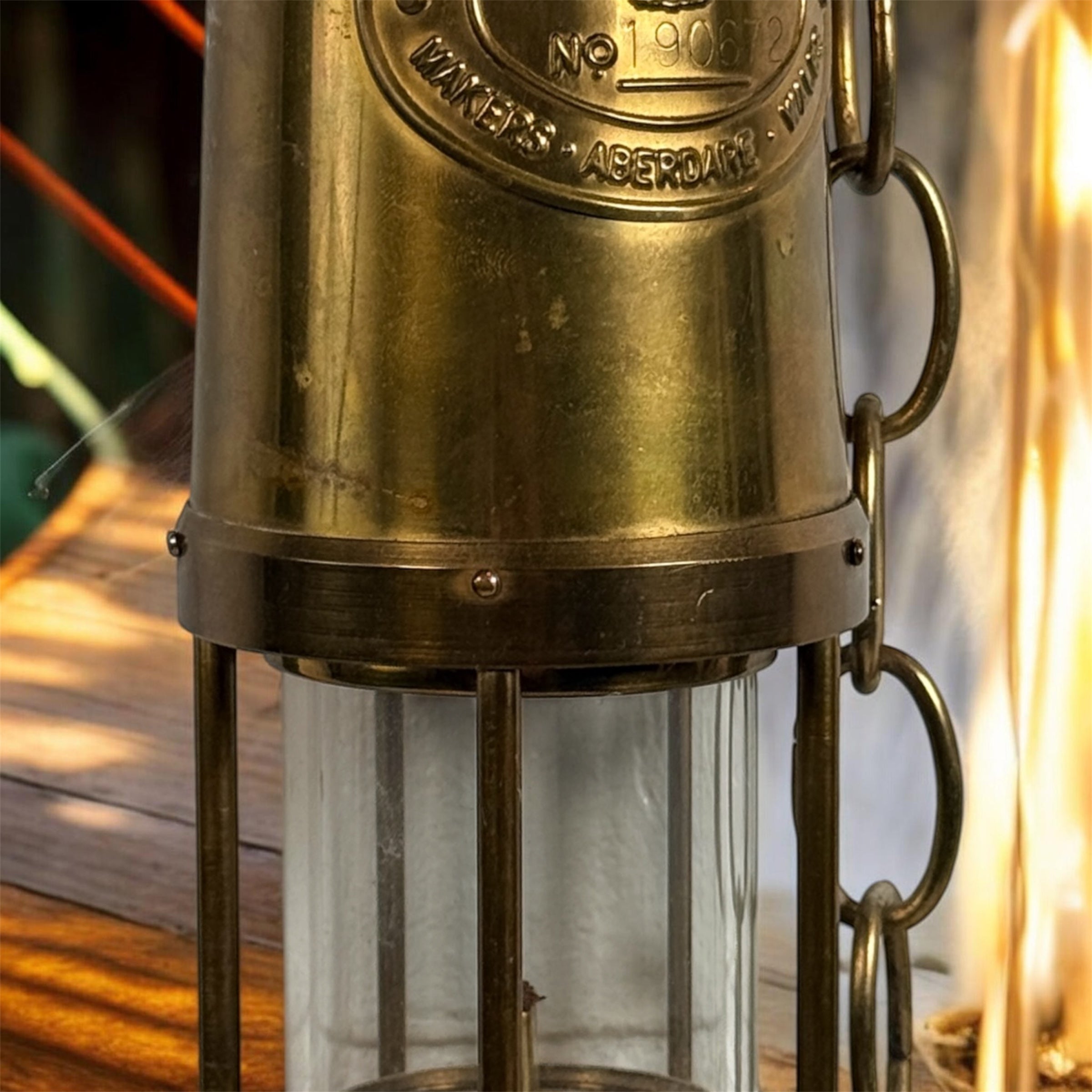Authentic Thomas Williams Cambrian Welsh miners lamp in brass with chain. Classic industrial decor collectible marked Aberdare Wales.
