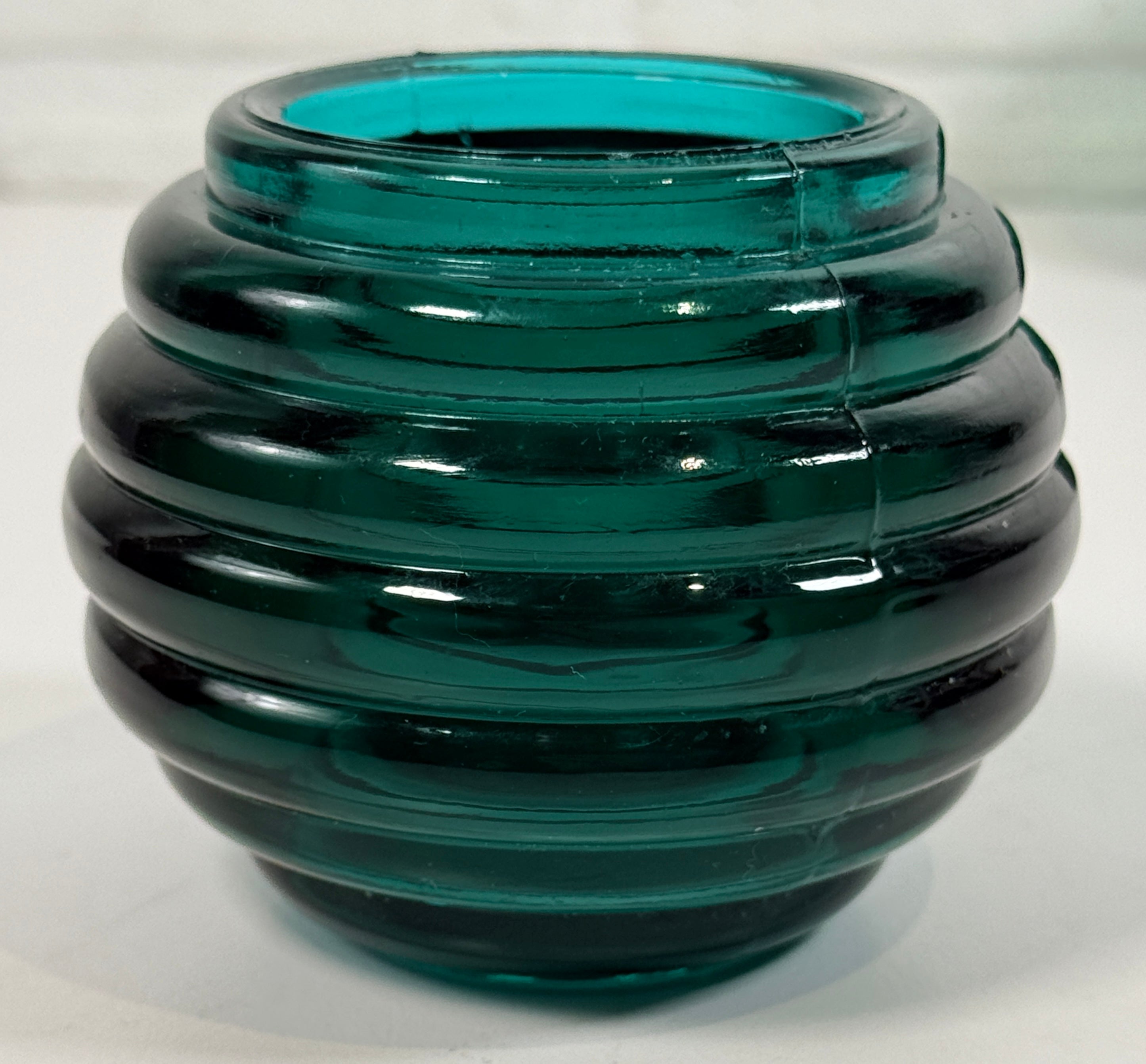Vintage teal ribbed glass votive holders pair with Art Deco style beehive design. Heavy decorative candle holders for modern vintage décor.