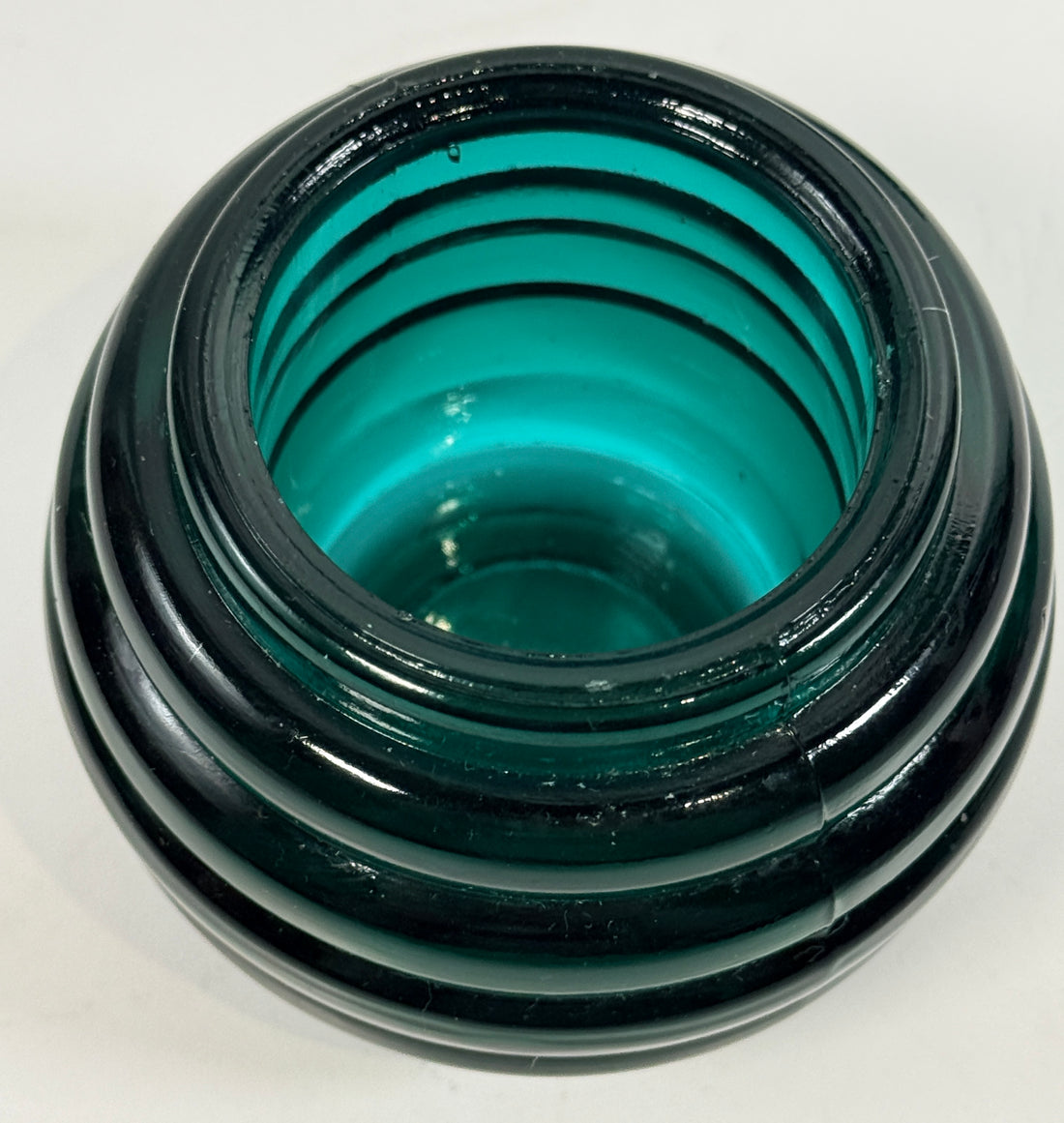 Vintage teal ribbed glass votive holders pair with Art Deco style beehive design. Heavy decorative candle holders for modern vintage décor.