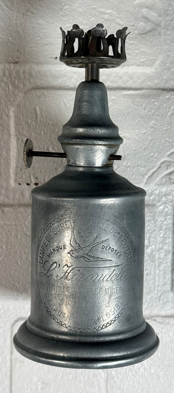 Antique French L’Hirondelle engraved spirit lamp with swallow logo, rare early 1900s industrial décor collectible from France.