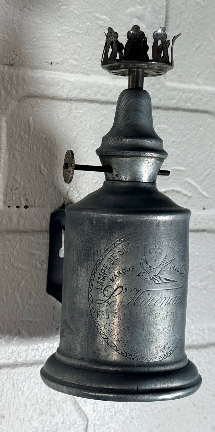 Antique French L’Hirondelle engraved spirit lamp with swallow logo, rare early 1900s industrial décor collectible from France.