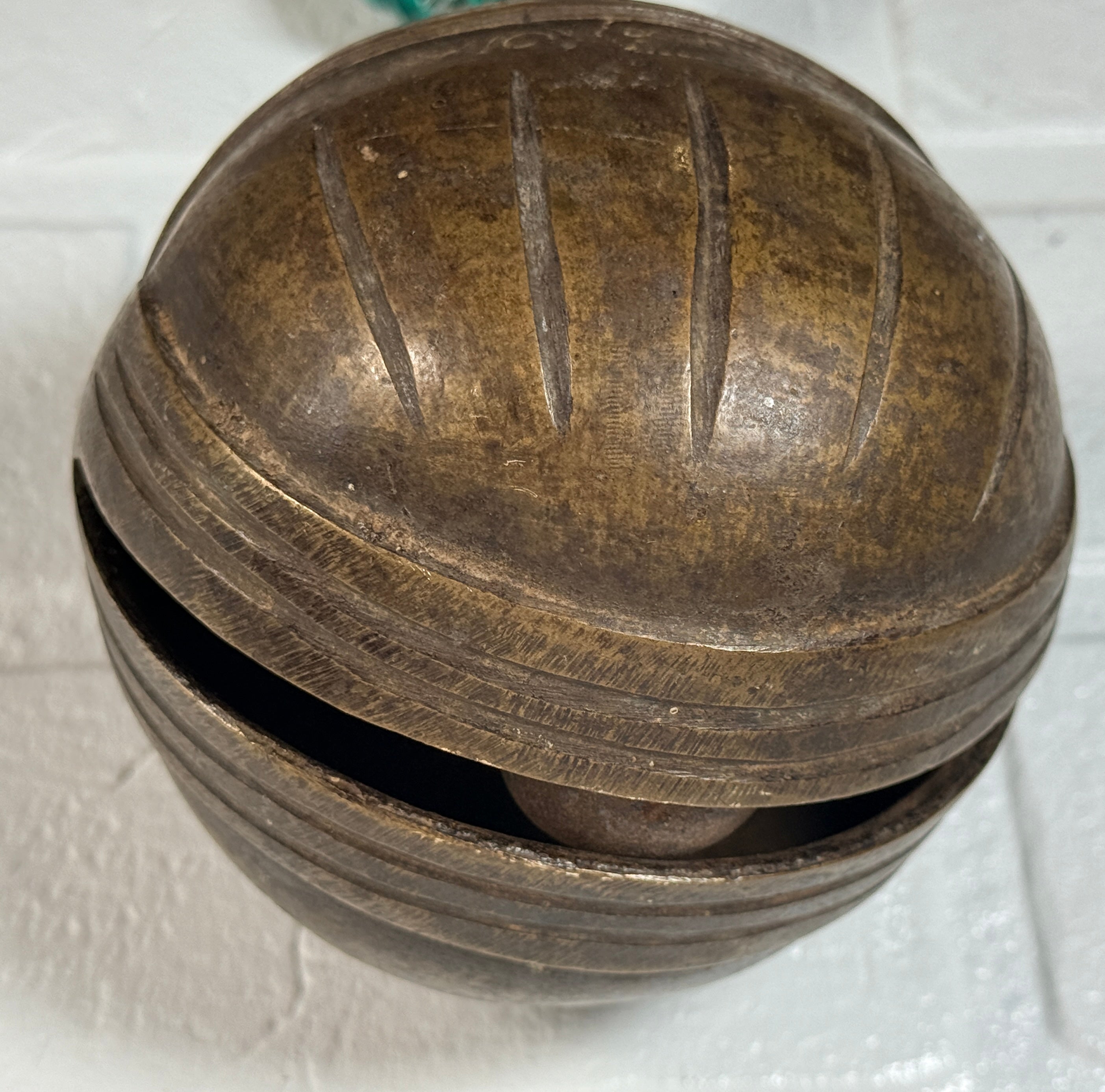 Vintage Burmese elephant bell in cast bronze with aged patina. Traditional Myanmar temple livestock bell with clapper, decorative folk art collectible.