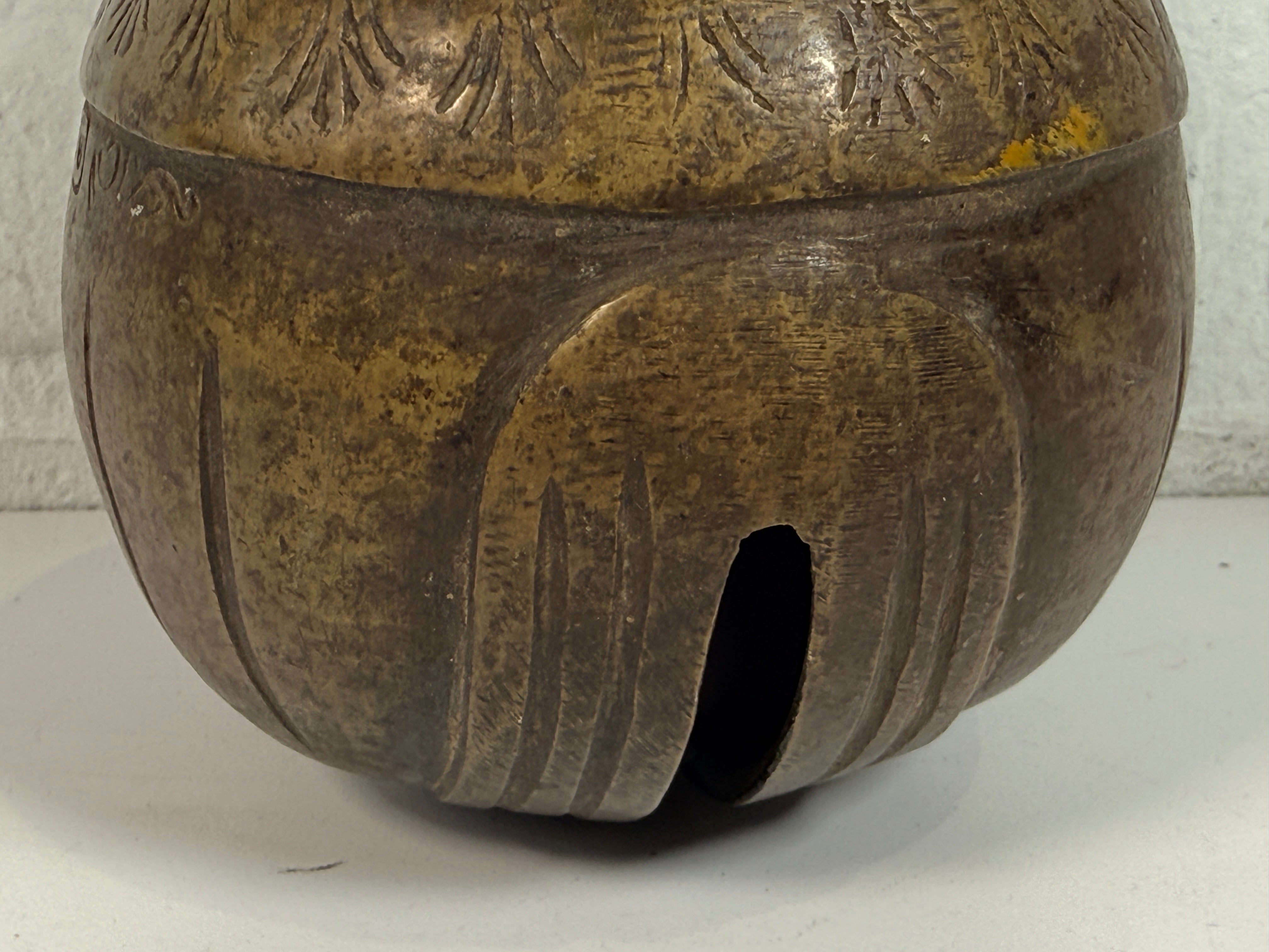 Vintage Burmese elephant bell in cast bronze with aged patina. Traditional Myanmar temple livestock bell with clapper, decorative folk art collectible.