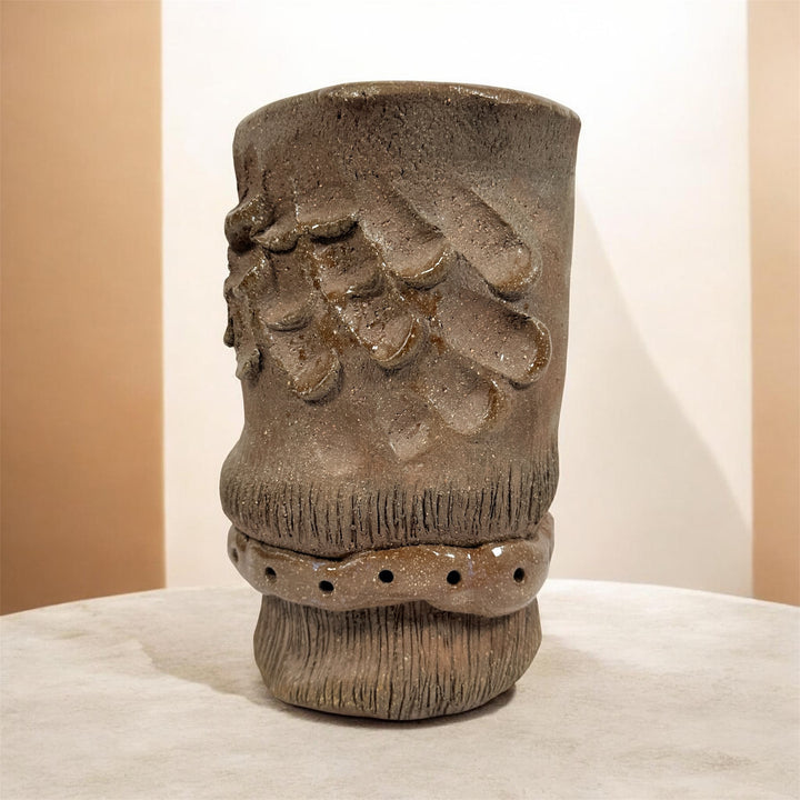 Vintage Brutalist studio pottery vessel with sculptural handmade form, earthy glaze, and organic modern décor appeal.