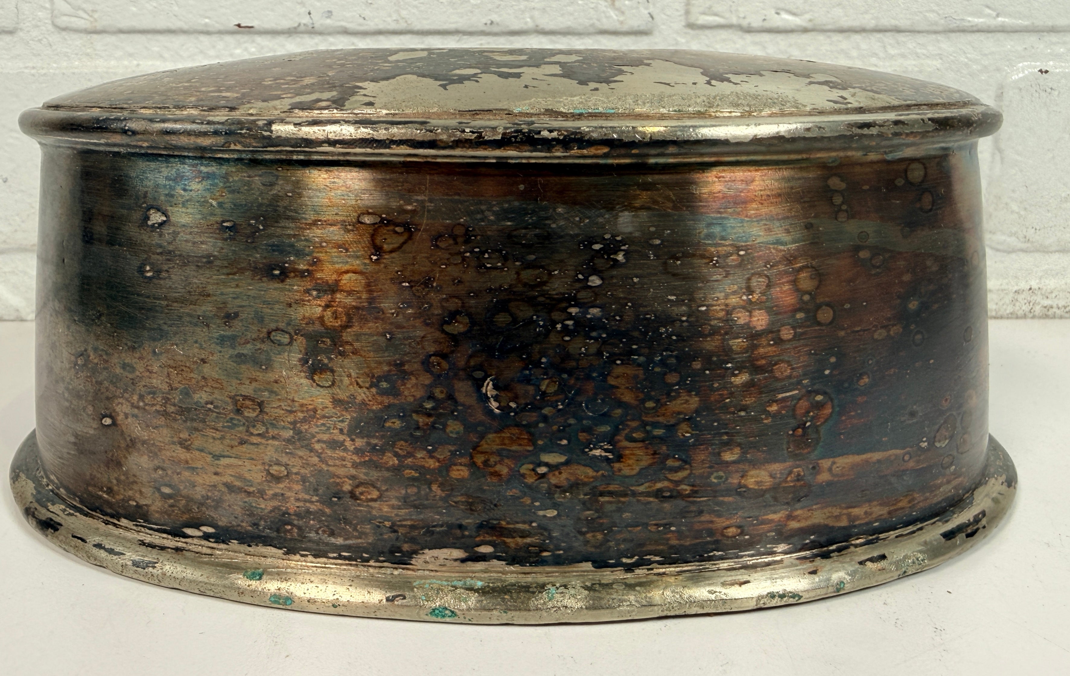 Vintage silverplate silent butler crumb catcher with oval form and rich aged patina. Elegant mid-century dining accessory and collectible tableware piece.