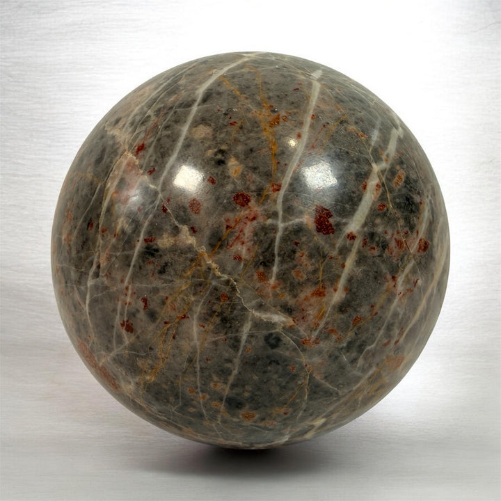 Large Polished Grey Jasper Stone Sphere, Red Iron Inclusions, 4in.