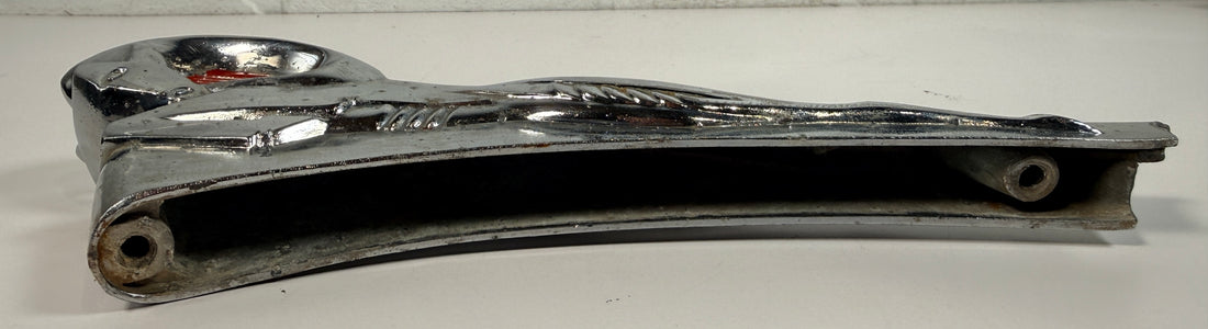 Vintage Dodge Ram hood ornament with red eyes, chrome mascot from the 1950s. Rare automobilia collectible for restoration, garage décor, or display