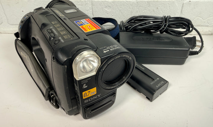 Sony CCD-TR87 Handycam Video8 XR camcorder with charger and battery. Untested vintage Sony camera sold as-is for repair, display or tape transfer use.