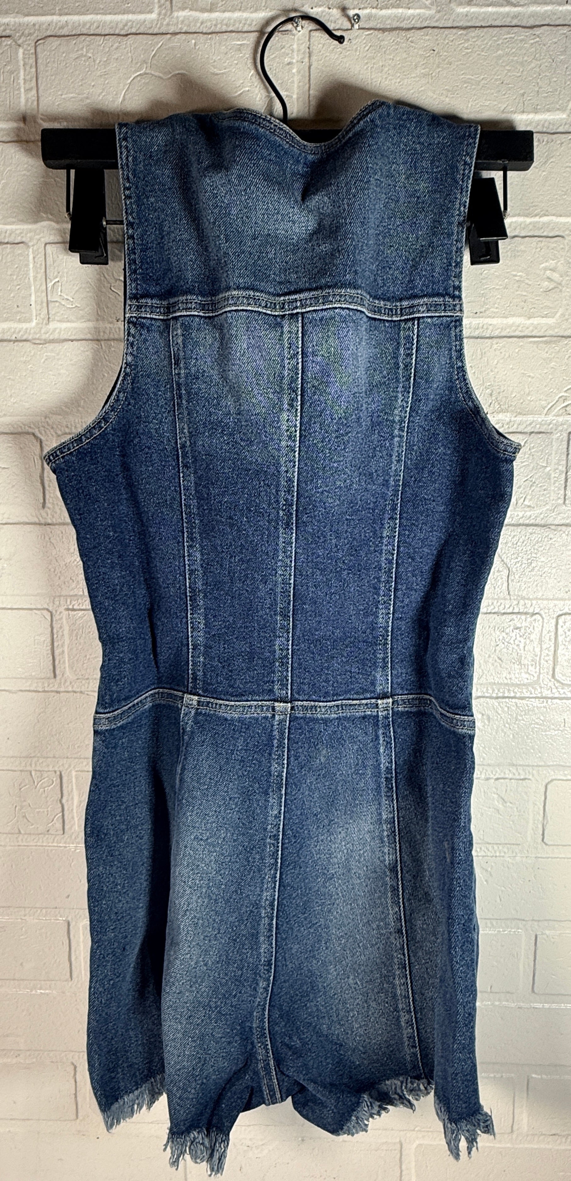 Guess Jennifer Lopez denim romper new with tags. Raw edge dark wash zip front shorts jumpsuit in medium size. Trendy Y2K style fashion piece.