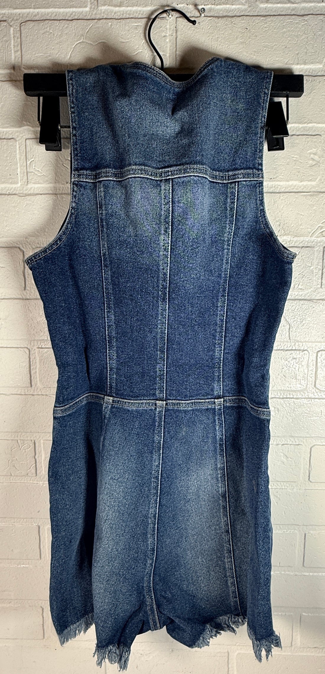 Guess Jennifer Lopez denim romper new with tags. Raw edge dark wash zip front shorts jumpsuit in medium size. Trendy Y2K style fashion piece.