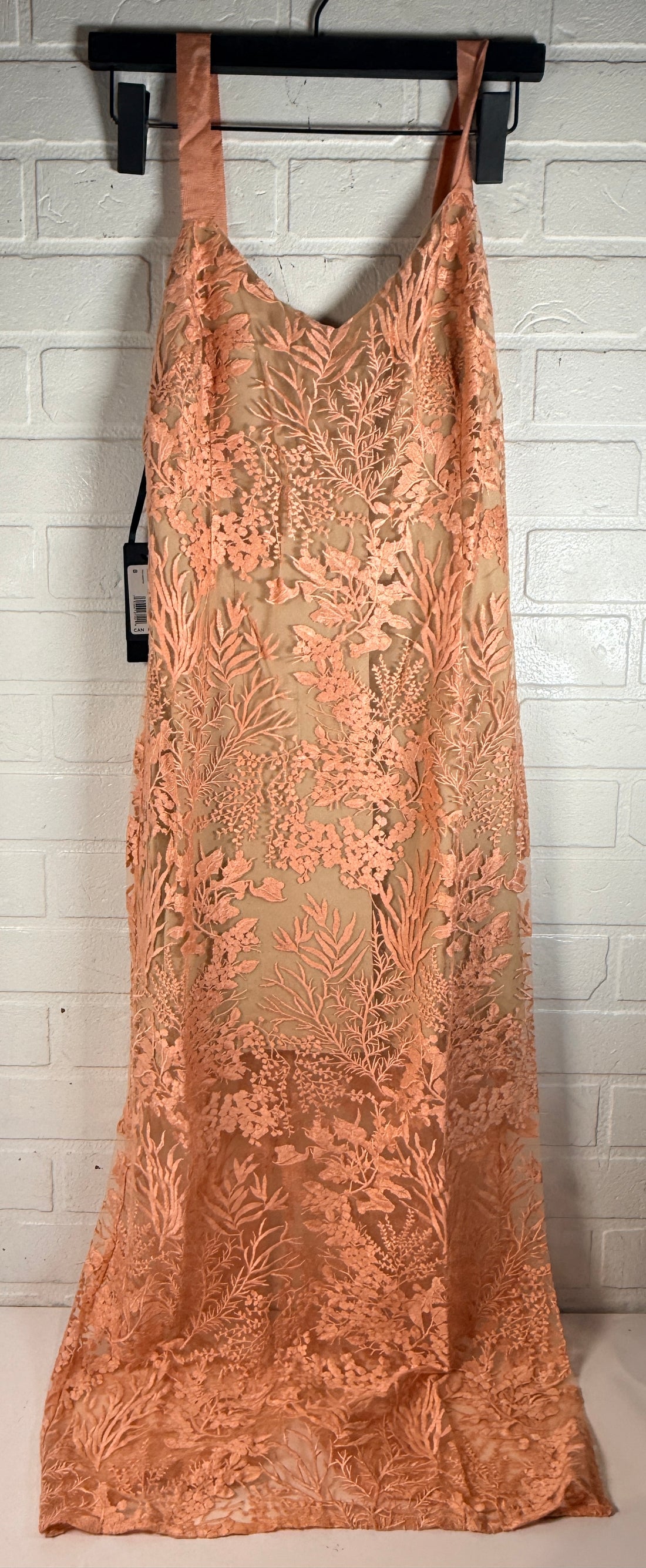 Marciano Kailey Dress size 8 in coral pink embroidered lace. Elegant formal gown with tags, fitted silhouette and sheer floral overlay.