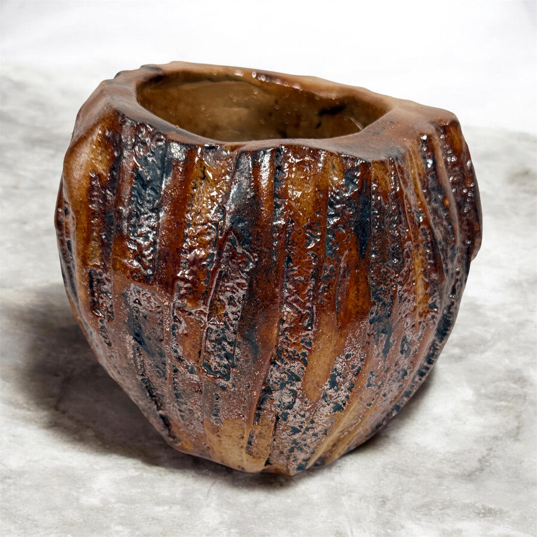 Vintage brutalist studio pottery planter with brown drip glaze and signed base. Mid-century handmade ceramic vessel for modern organic décor.