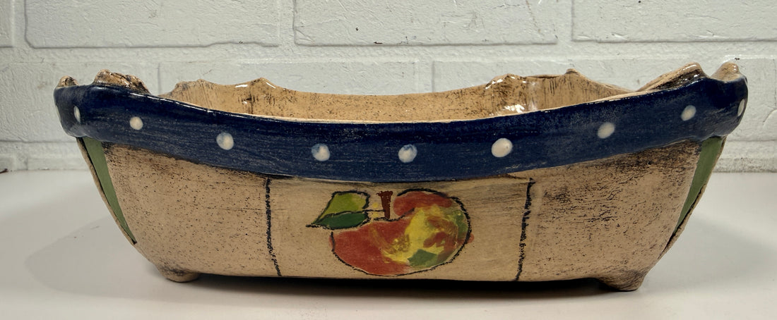 Signed studio pottery apple bowl with rustic farmhouse style, hand-painted ceramic fruit bowl, decorative artisan serving dish.