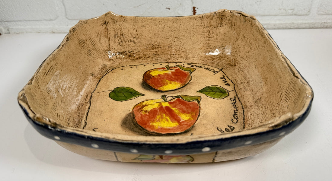 Signed studio pottery apple bowl with rustic farmhouse style, hand-painted ceramic fruit bowl, decorative artisan serving dish.