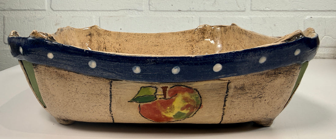 Signed studio pottery apple bowl with rustic farmhouse style, hand-painted ceramic fruit bowl, decorative artisan serving dish.