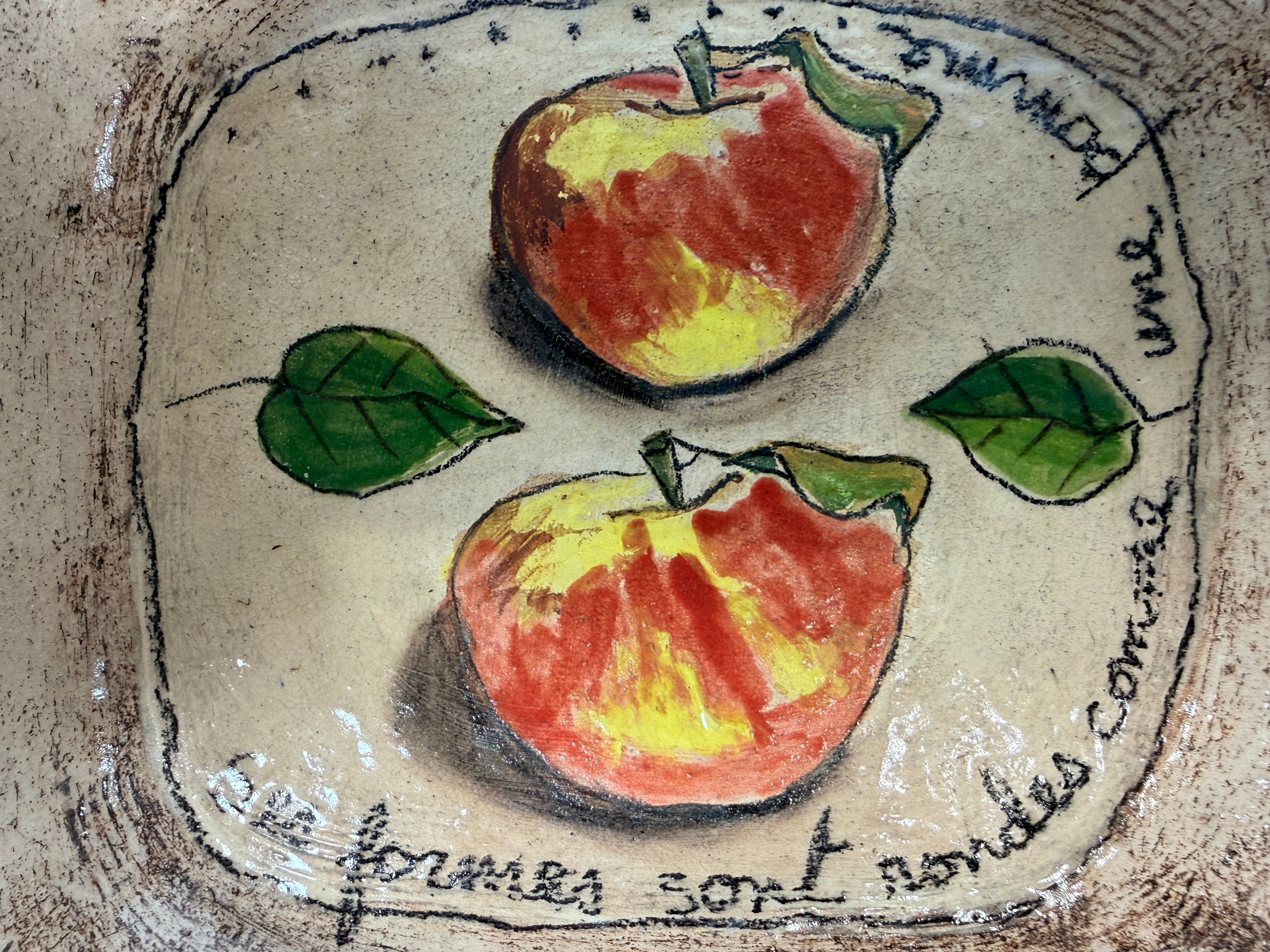 Signed studio pottery apple bowl with rustic farmhouse style, hand-painted ceramic fruit bowl, decorative artisan serving dish.