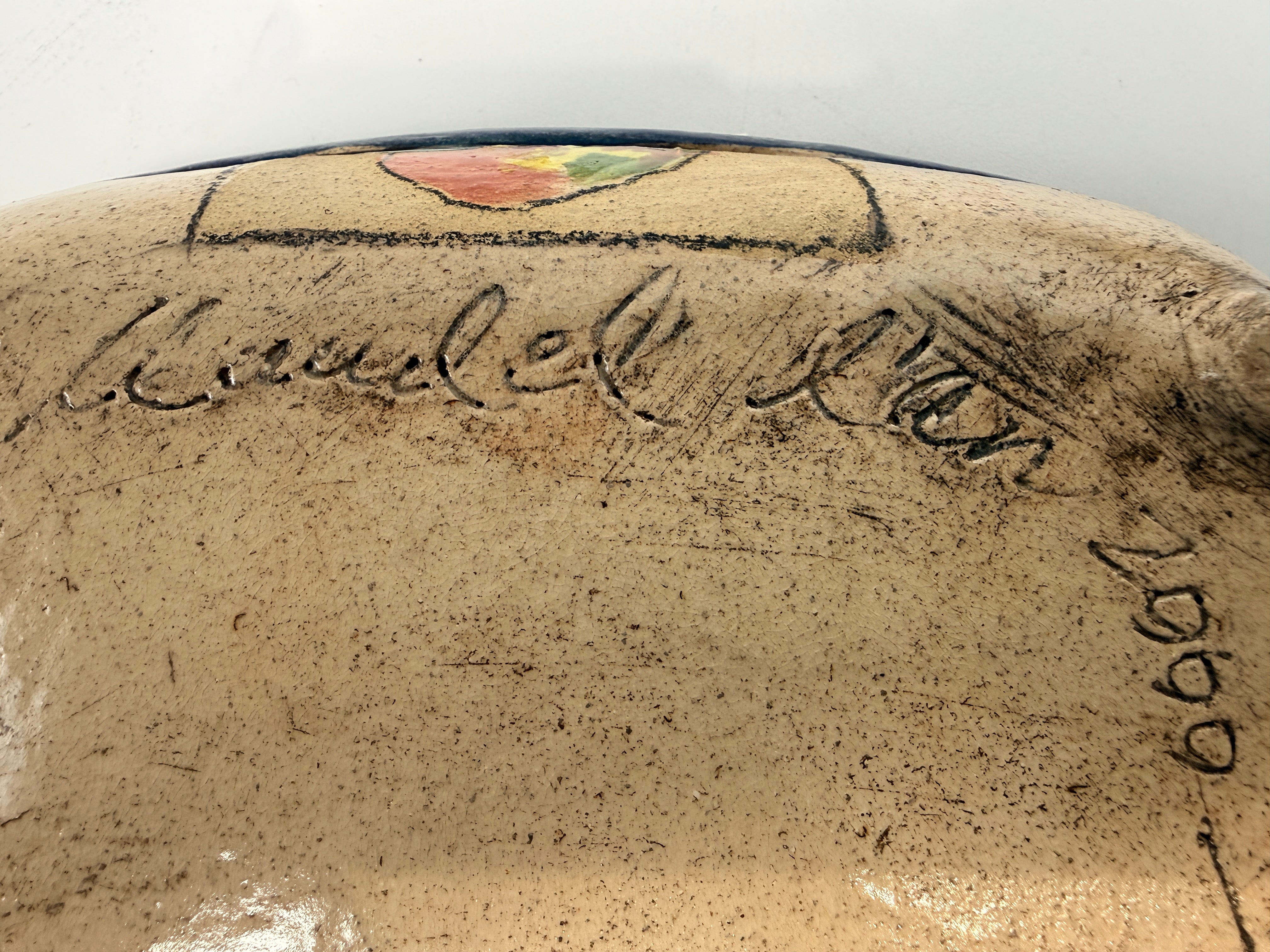 Signed studio pottery apple bowl with rustic farmhouse style, hand-painted ceramic fruit bowl, decorative artisan serving dish.
