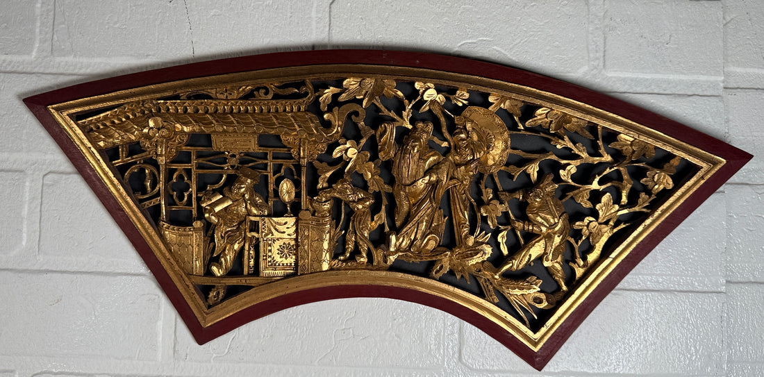 Vintage Chinese carved gilt wood wall panel in fan shape, detailed figural scene, mid-century Chinoiserie décor, openwork carving statement piece.