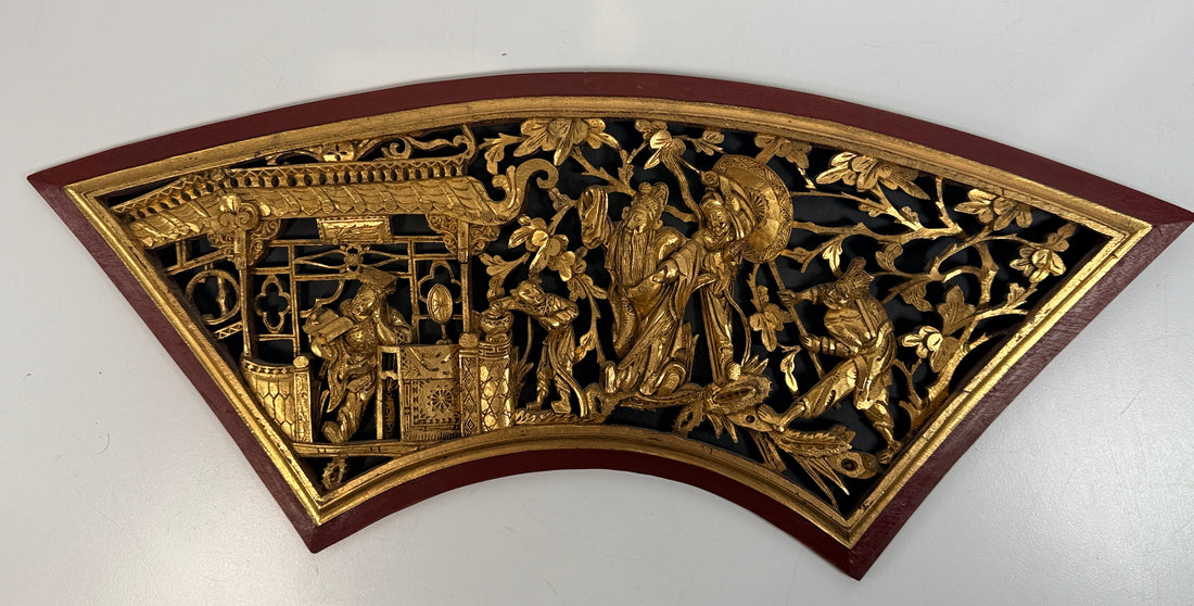 Vintage Chinese carved gilt wood wall panel in fan shape, detailed figural scene, mid-century Chinoiserie décor, openwork carving statement piece.