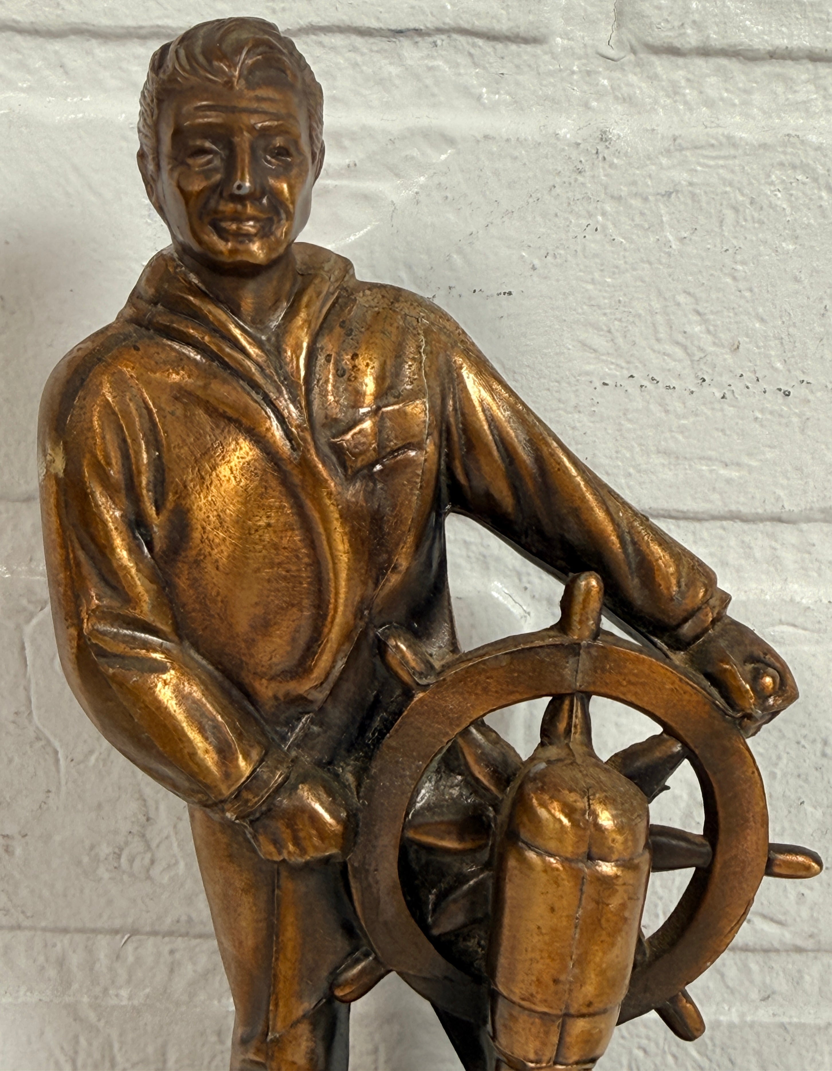 Vintage 1969 sailor helm award statue with bronze finish on wood base. Nautical décor piece with plaque, ideal for maritime collectors or mid-century display